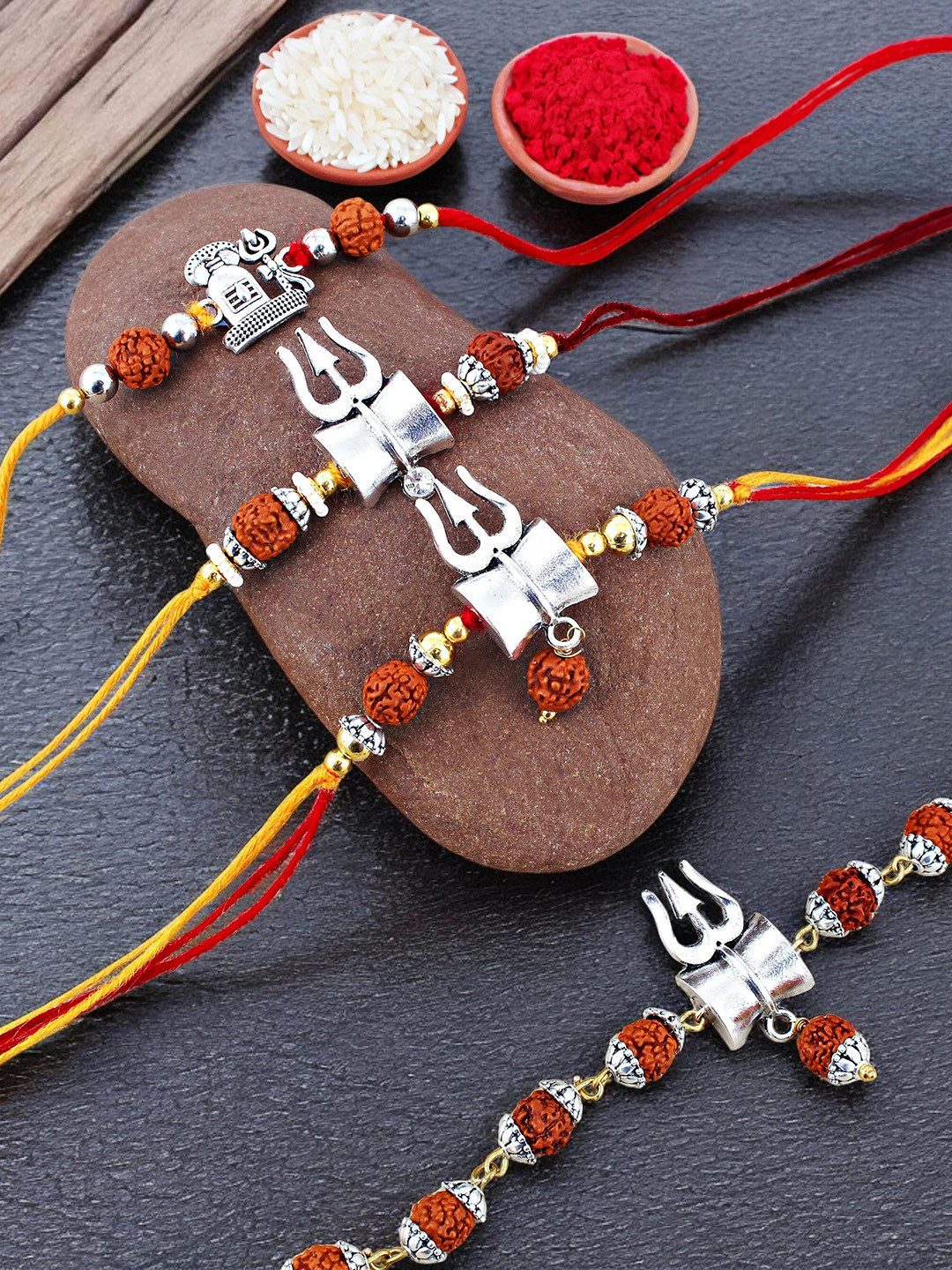 LUCKY JEWELLERY 4-Pcs Rudrakhsha-Charm Rakhi With Roli Chawal & Greeting Card