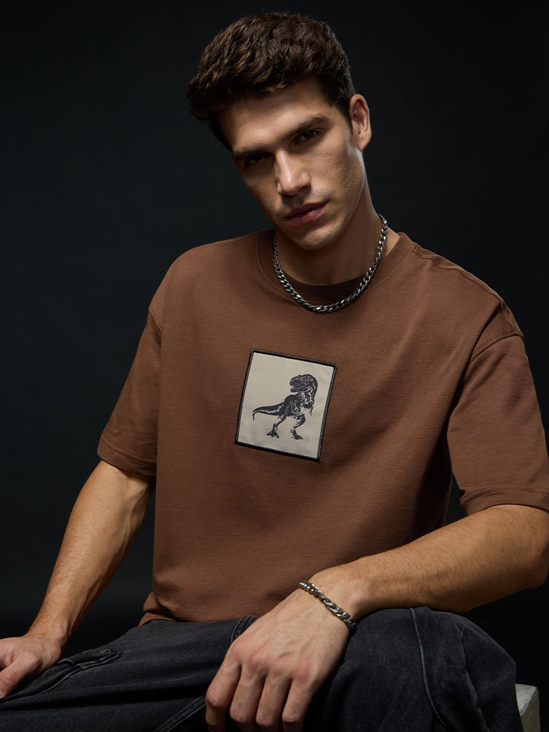 The Souled Store Official Men Jurassic World: T-Rex Footprint Brown Oversized Fit T-Shirt