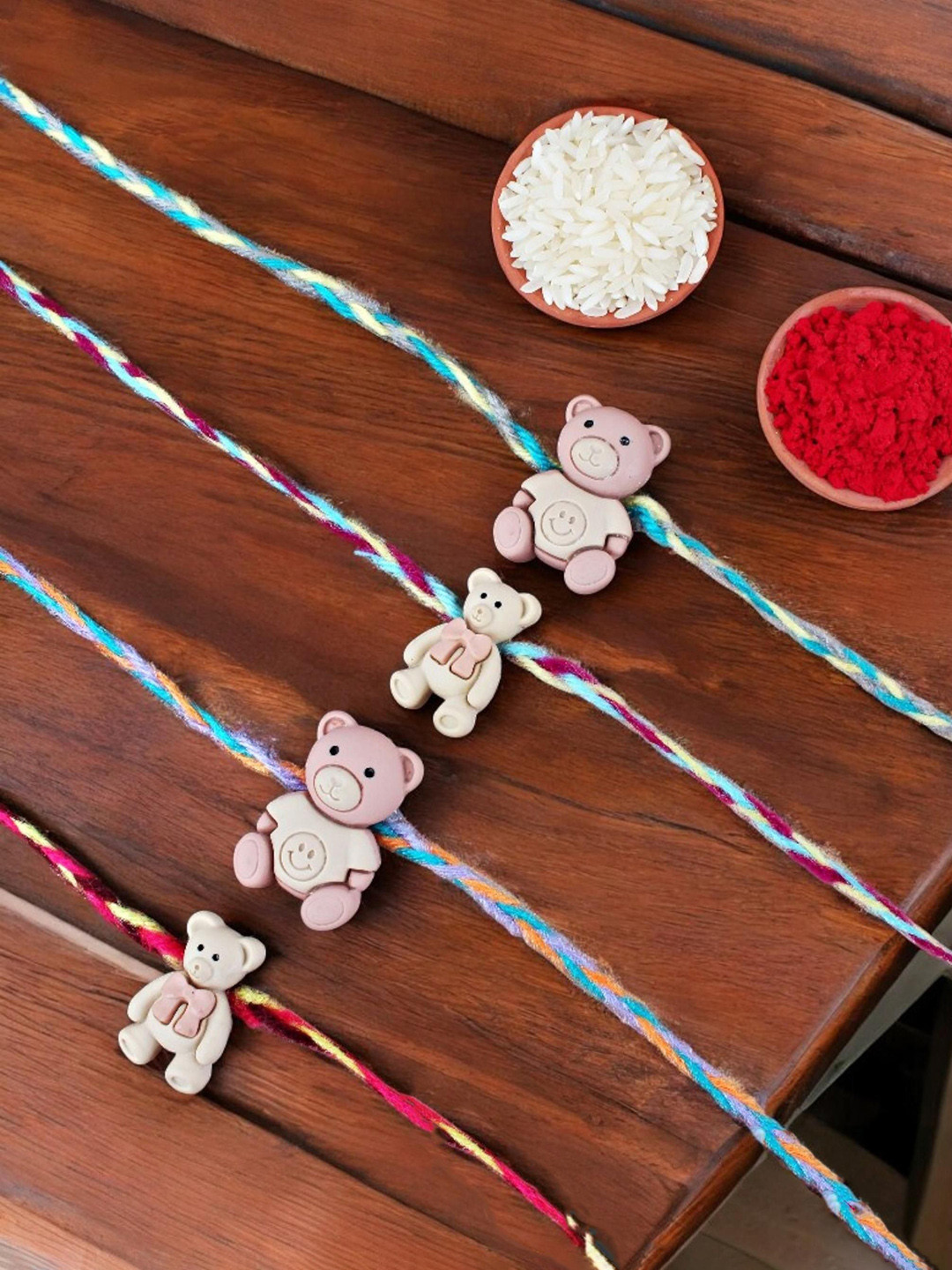 LUCKY JEWELLERY Kids Set Of 4 Trendy Teddy Bear Design Thread Rakhi With Greeting Card