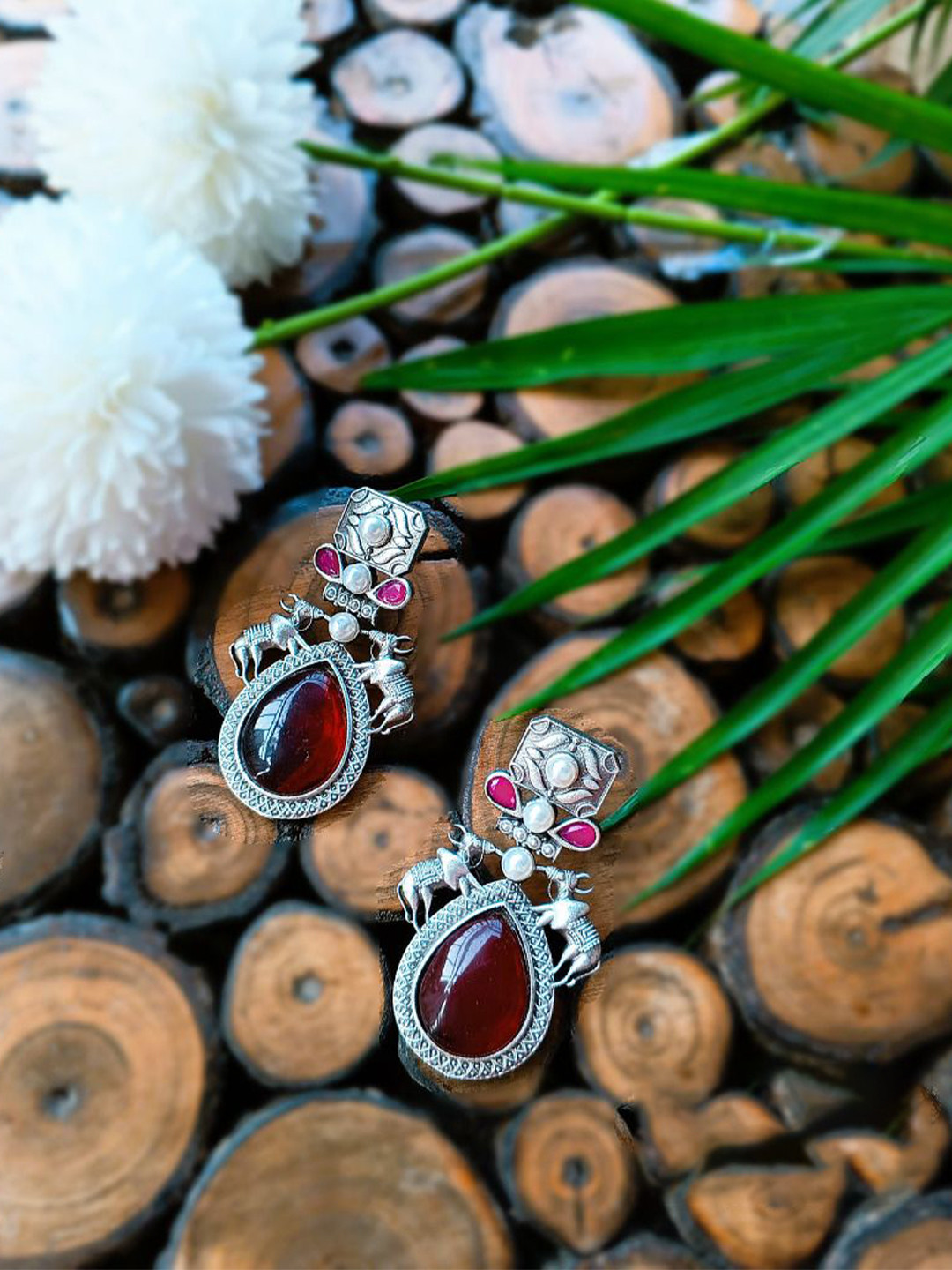 Poush Luxury Stones Studded & Beaded Oxidised Bull Teardrop Shaped Drop Earrings