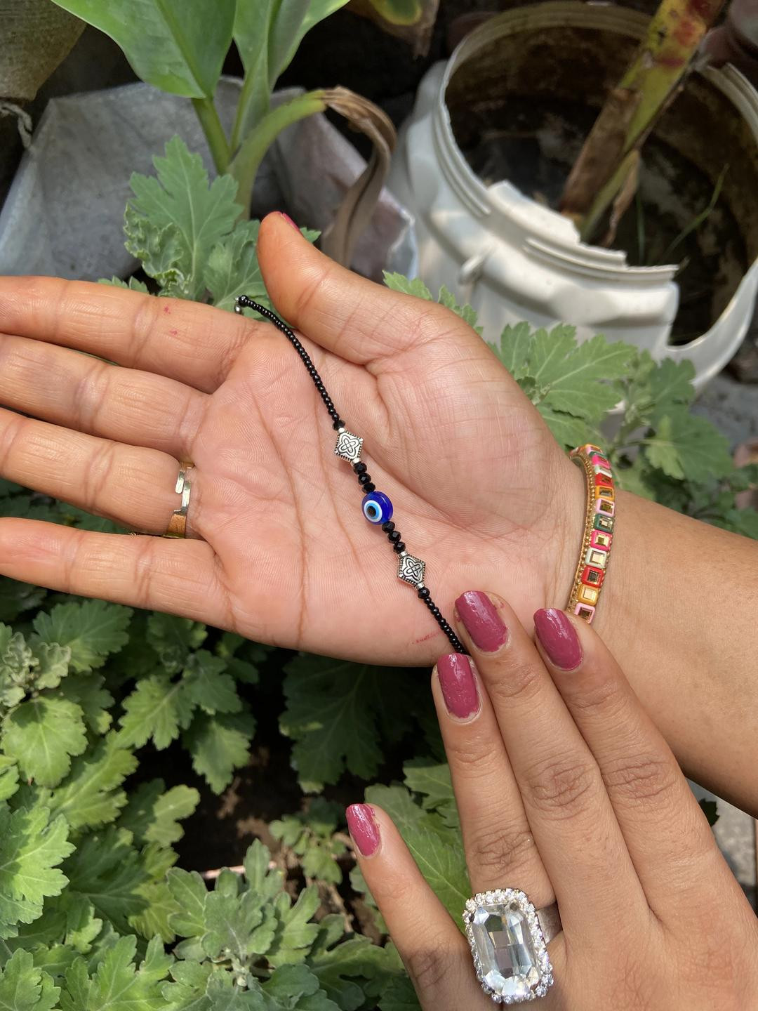 Evil Eye Black Beaded Bracelet with Silver Charms