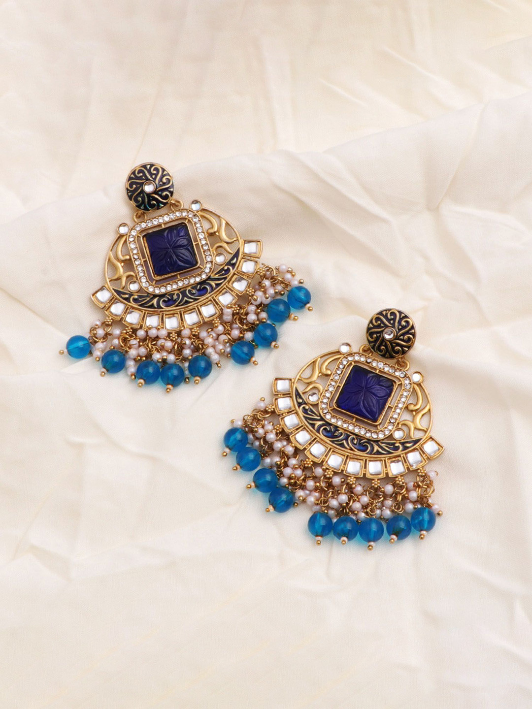 CAPILITE Jewellers Brass-Plated Kundan Studded & Pearls Beaded Crescent Chandbalis