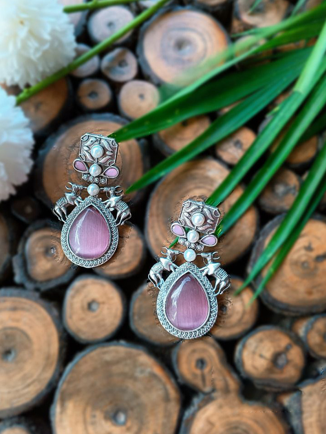 Poush Luxury Stones Studded & Beaded Oxidised Bull Teardrop Shaped Drop Earrings