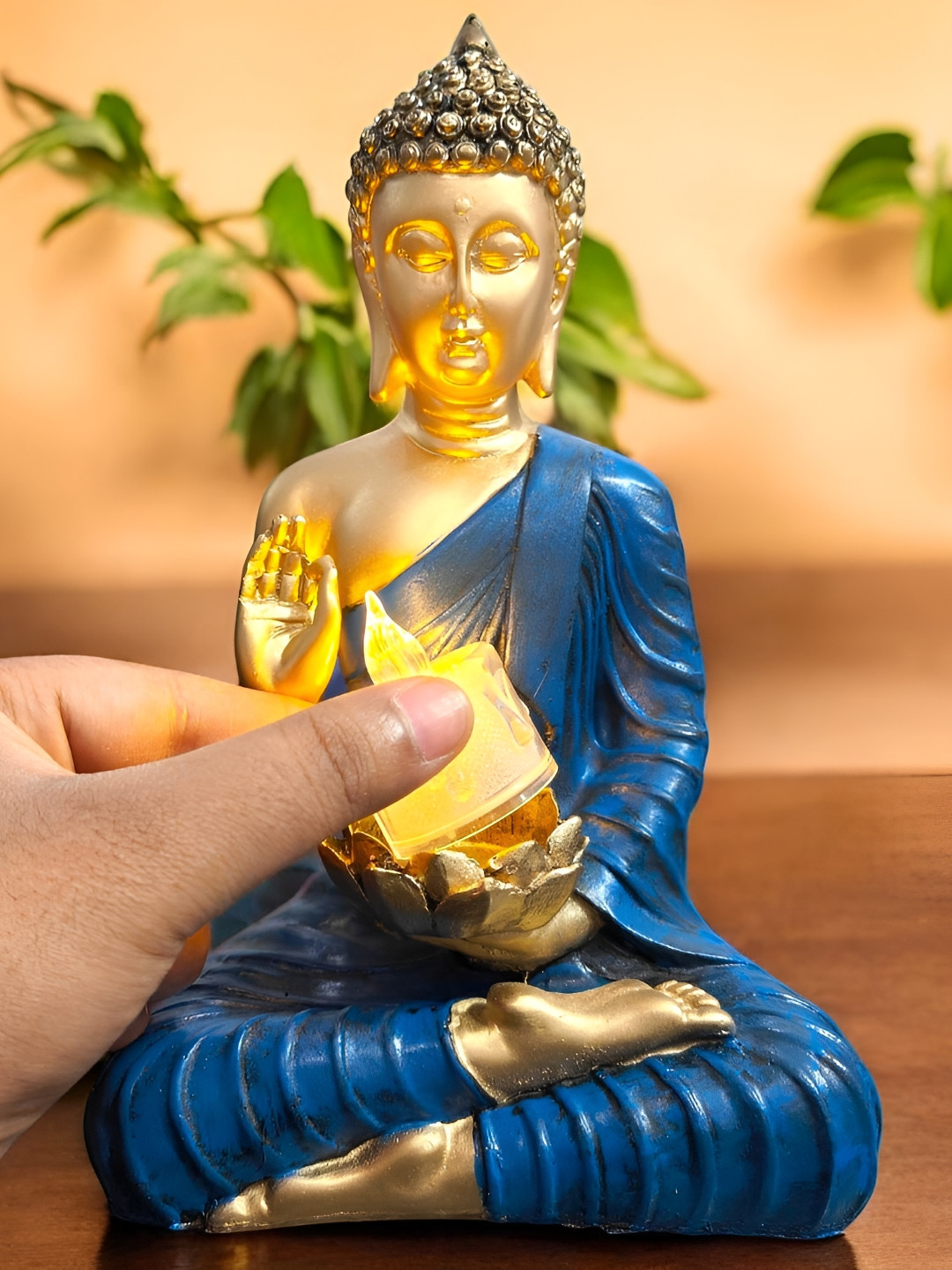 SkyKey Blue & Gold Toned Polyresin Sitting Buddha Idol With Candle Holder Statue Showpiece