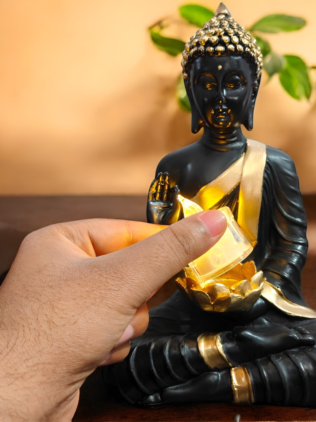 SkyKey Black & Gold-Toned Sitting Buddha Idol With Candle Holder Statue Showpiece