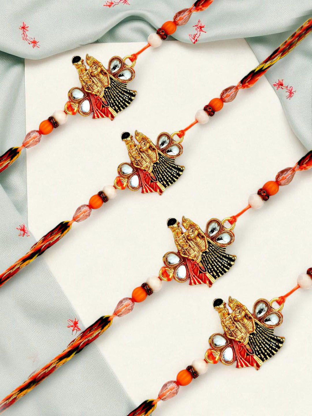 ADIVA Set Of 4 Krishna Kundan-Studded & Beaded Rakhis With Pooja Thali & Roli Chawal