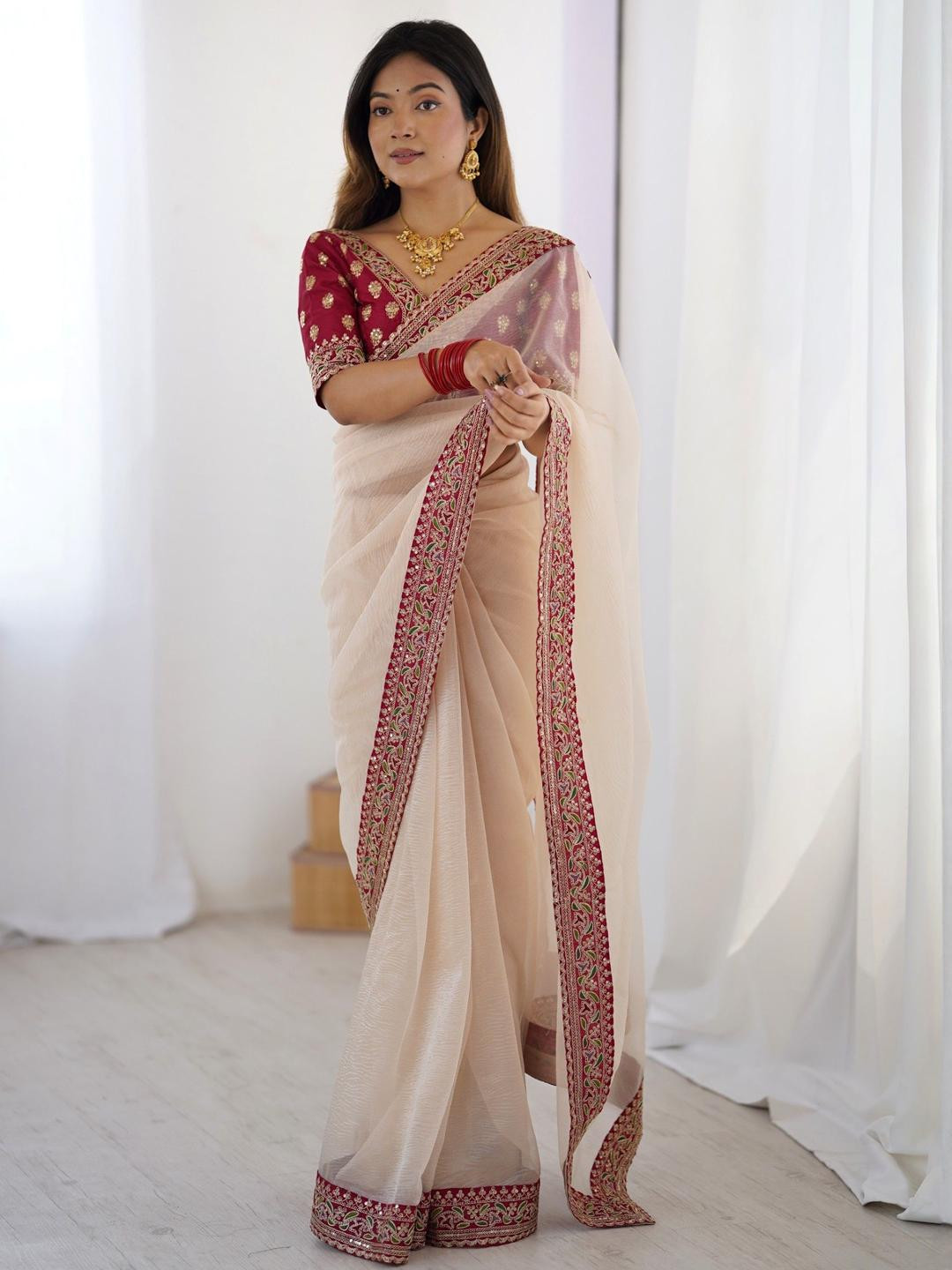 Panzora Sequinned Embroidered Border Net Saree With Contrast Blouse Piece