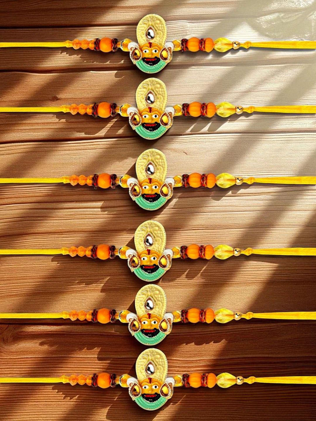 ADIVA Set Of 6 CZ Studded & Beaded Lord Khatu Rakhis Roli Chawal & Greetings Card
