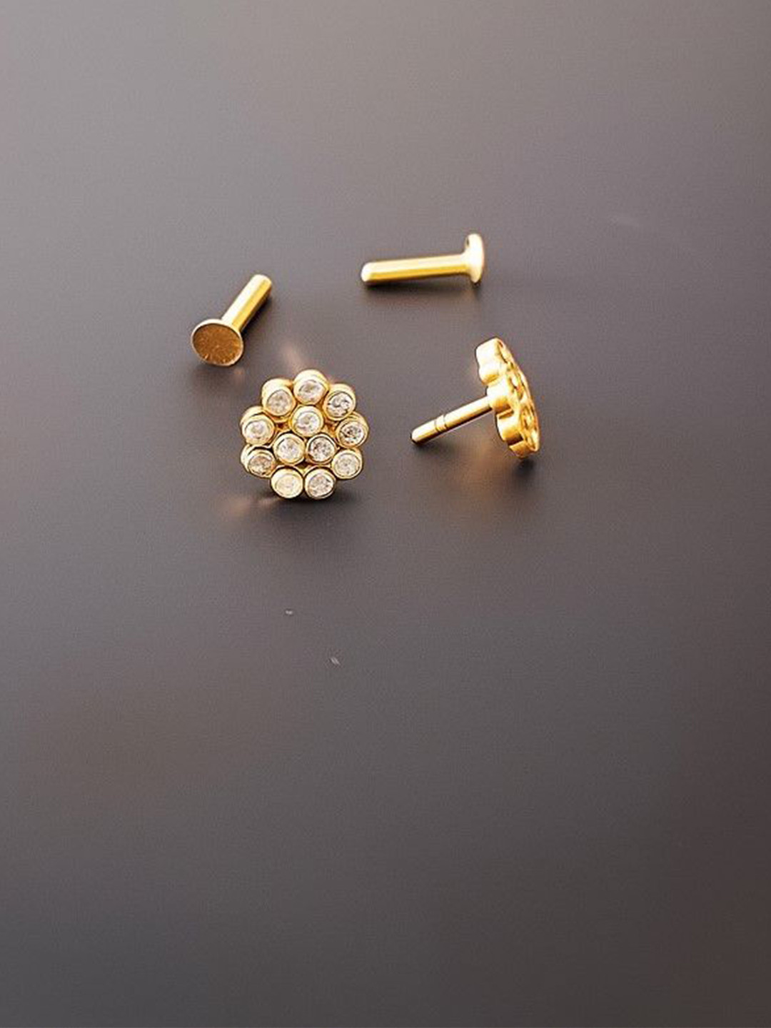 maan Gold-Plated American Diamond Studded Floral Shaped Studs