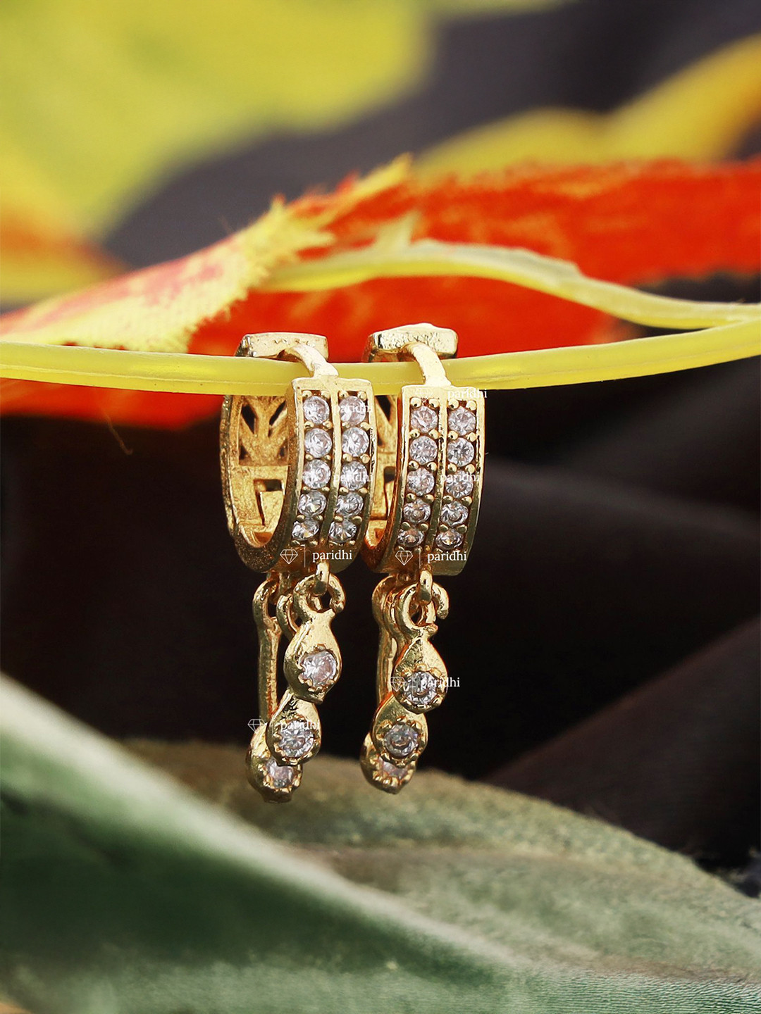 maan Gold-Plated American Diamond Studded Circular Shaped Hoop Earrings