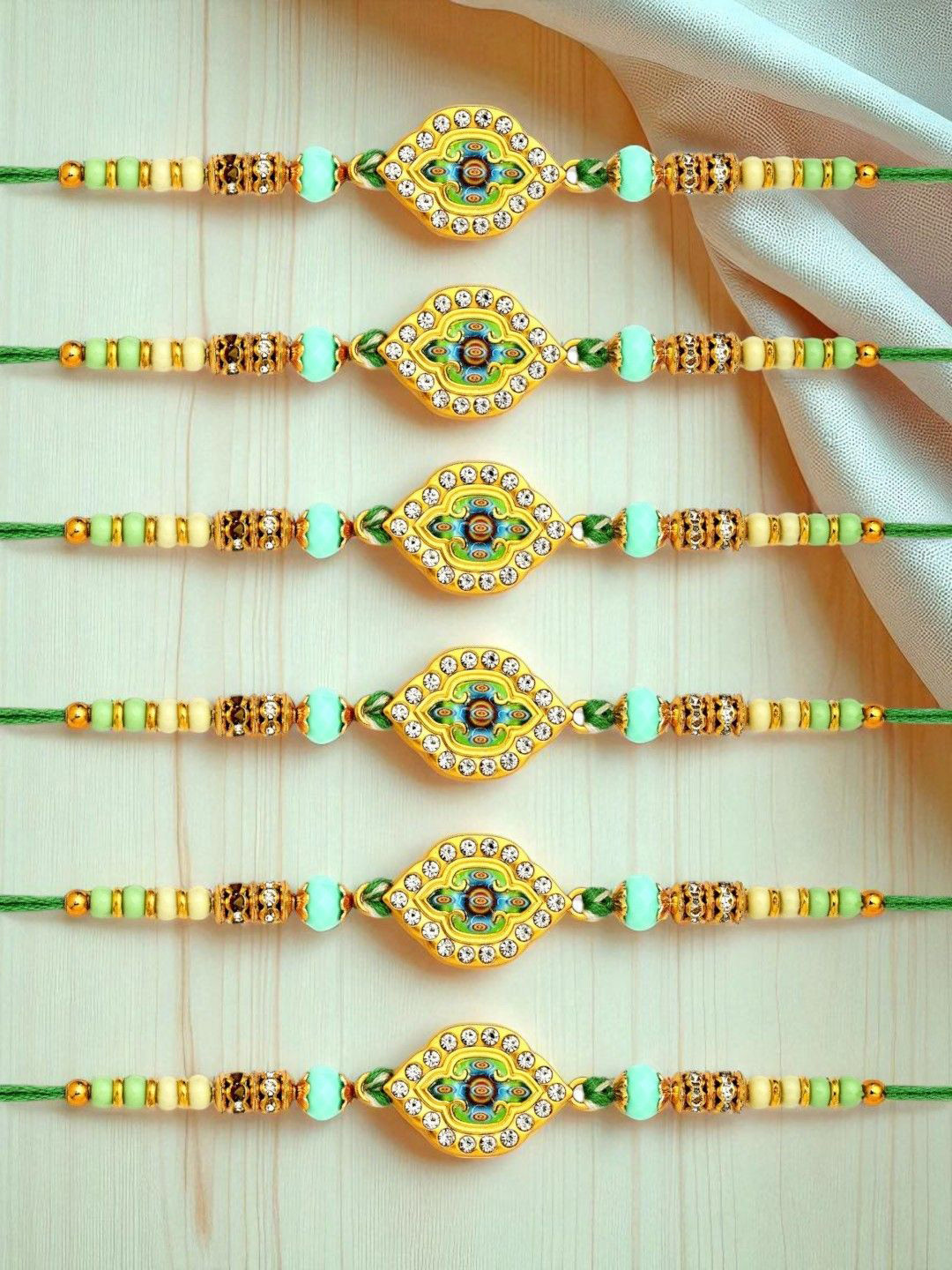 ADIVA Set Of 6 CZ Beaded Evil Eye Thread Rakhis With Roli Chawal Chandan & Meshrei Card