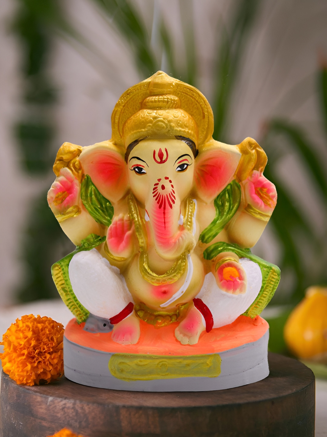 TIED RIBBONS Orange Colored & Green Lord Ganesha Religious Idol Showpiece