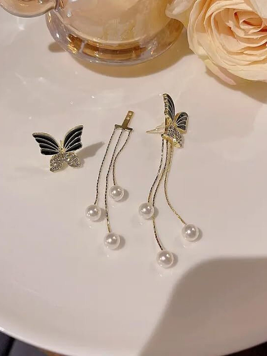 CIKIT Stone Studded & Pearls Beaded Butterfly Shaped Tasselled Drop Earrings