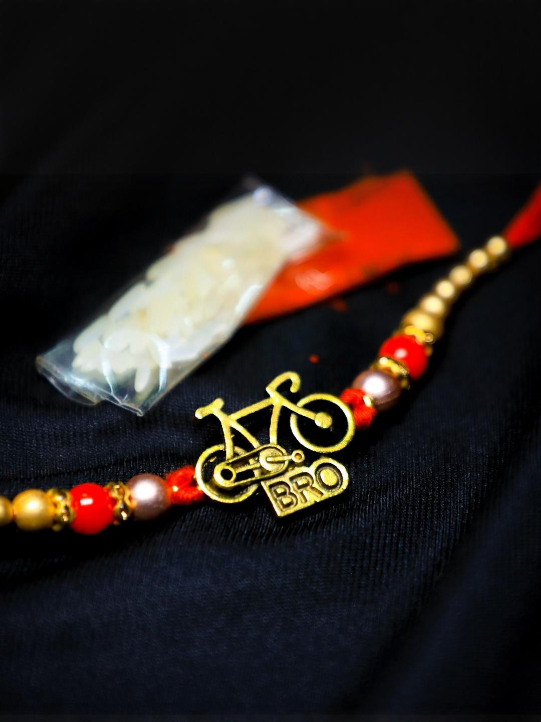 TOS Fancy Artificial Beaded Thread Rakhi With Roli Chawal