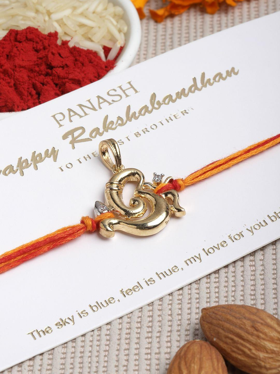 PANASH Gold Plated Artificial Stones Studded Ganesha Thread Rakhi With Roli Chawal