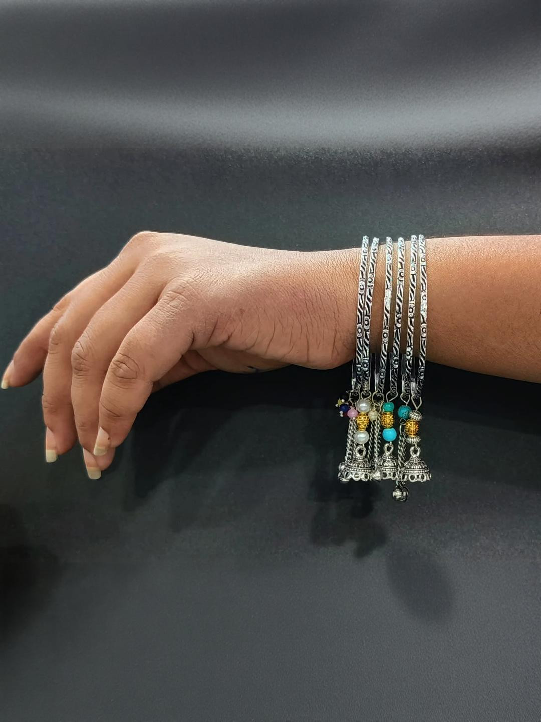 gurjari jewellers Women Set Of 6 Silver Oxidised Jhumka And Beads Charm Bangles