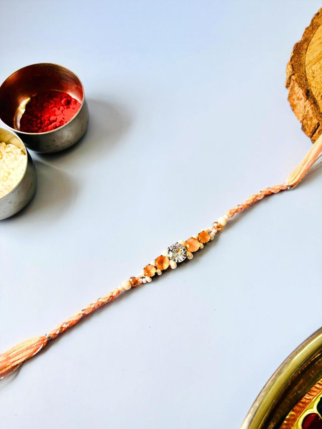 Tipsy closet Kundan Meenakari Stone Studded & Beaded Thread Rakhi