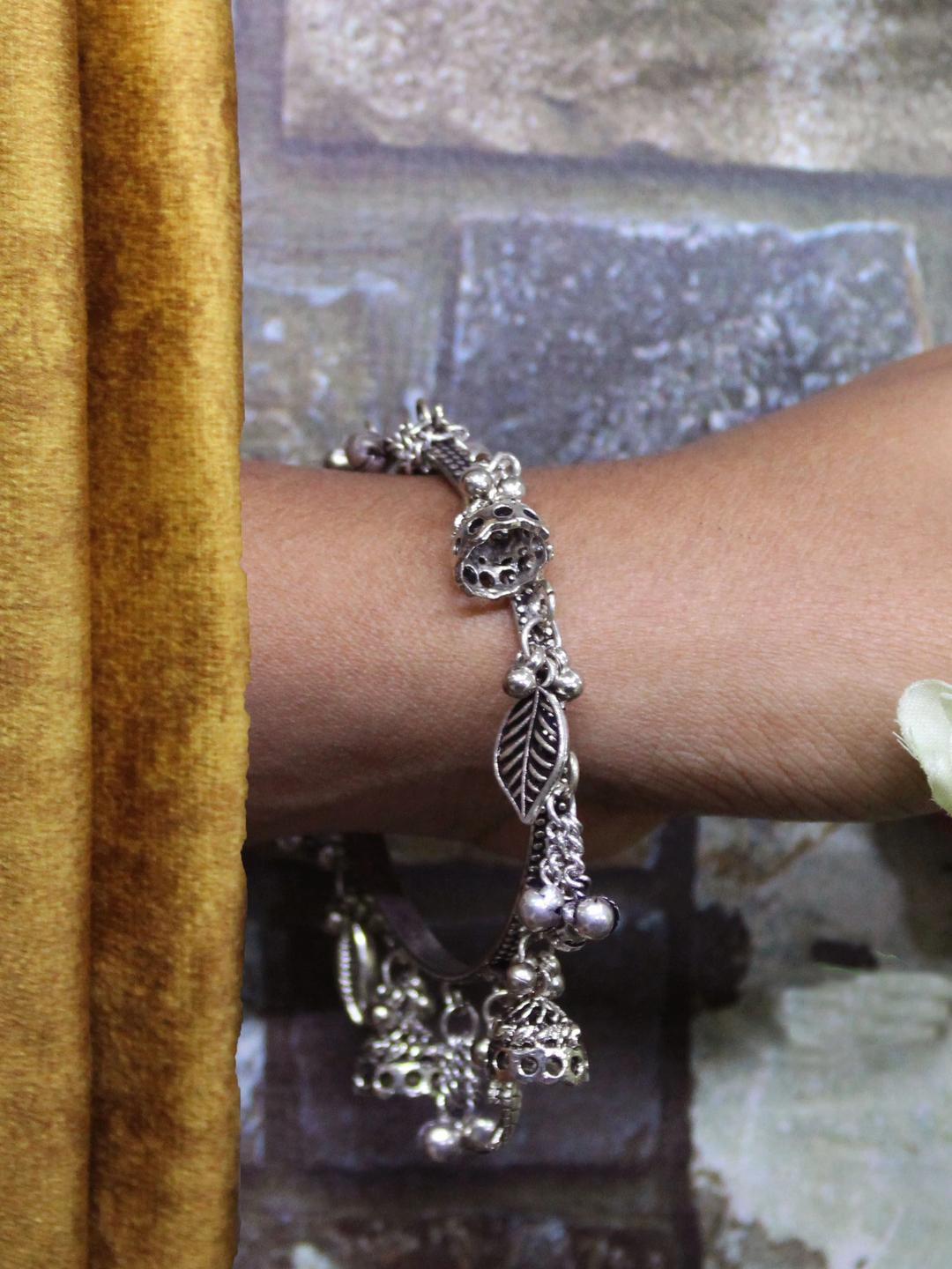 gurjari jewellers Set of 2 Silver Oxidised Jhumki Charm With Gungru Bangle