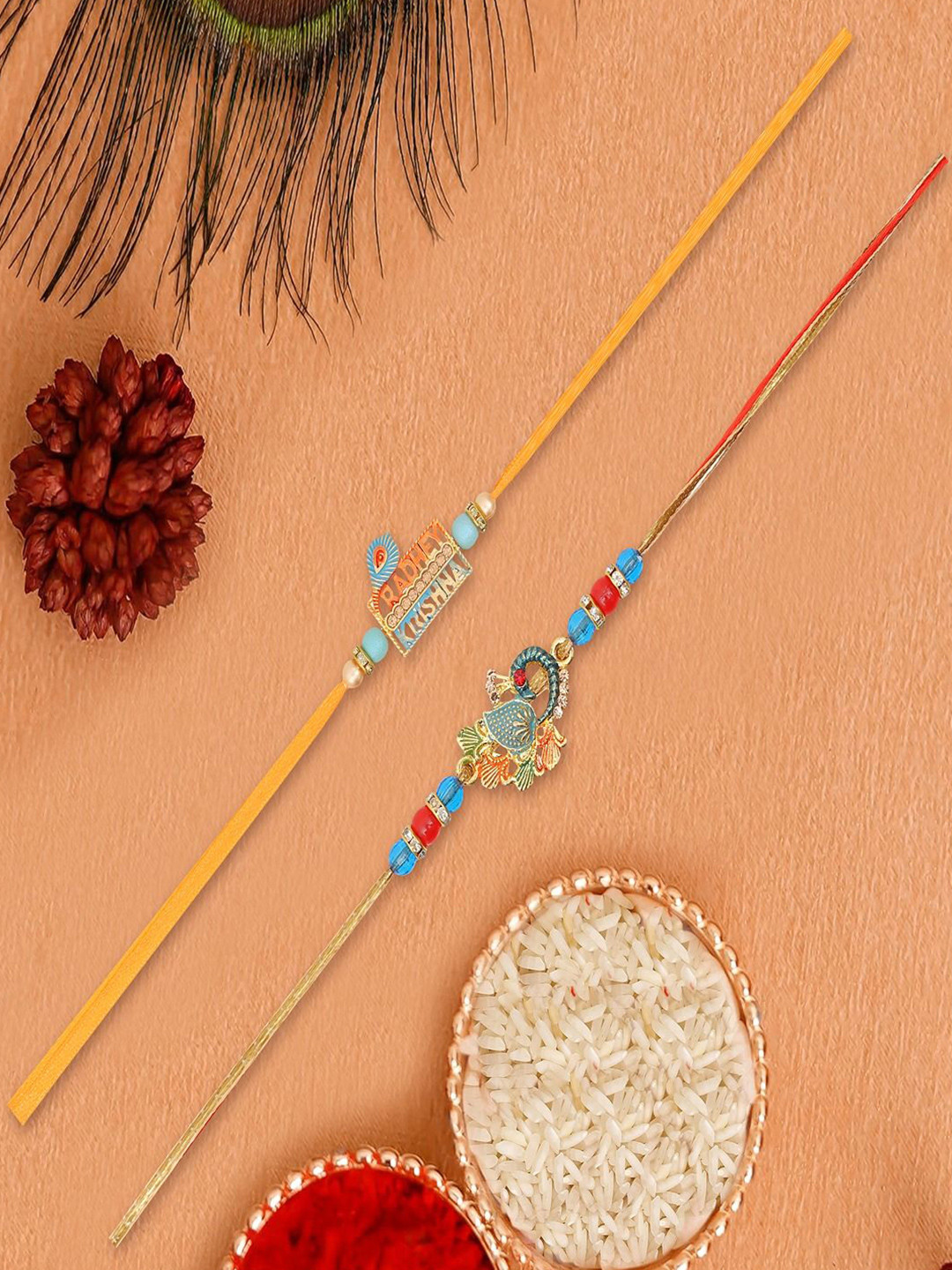 UNIVERSITY TRENDZ Set Of 2 Radhey Krishna & Peacock Thread Rakhis With Roli Chawal