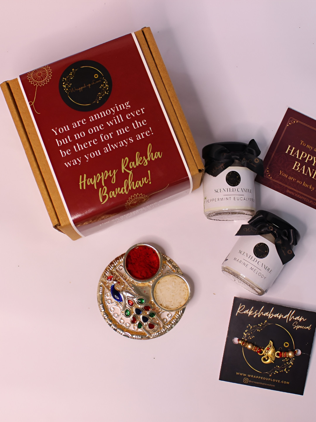 Wrapped up Love Lord Ganesh Artificial Beaded Rakhi Gift Set With Scented Candles