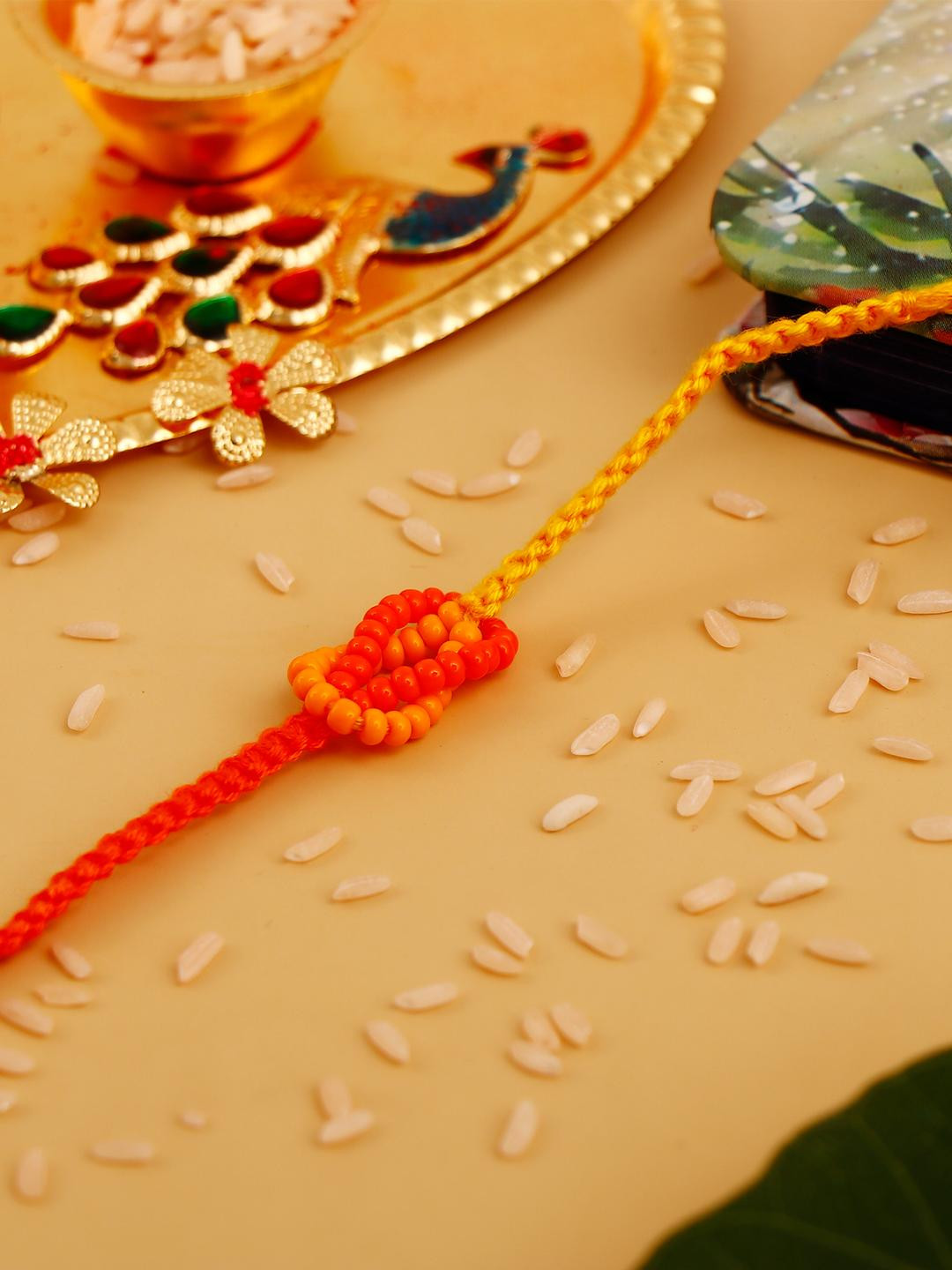 Archies Beaded Yellow and Orange Thread Rakhi