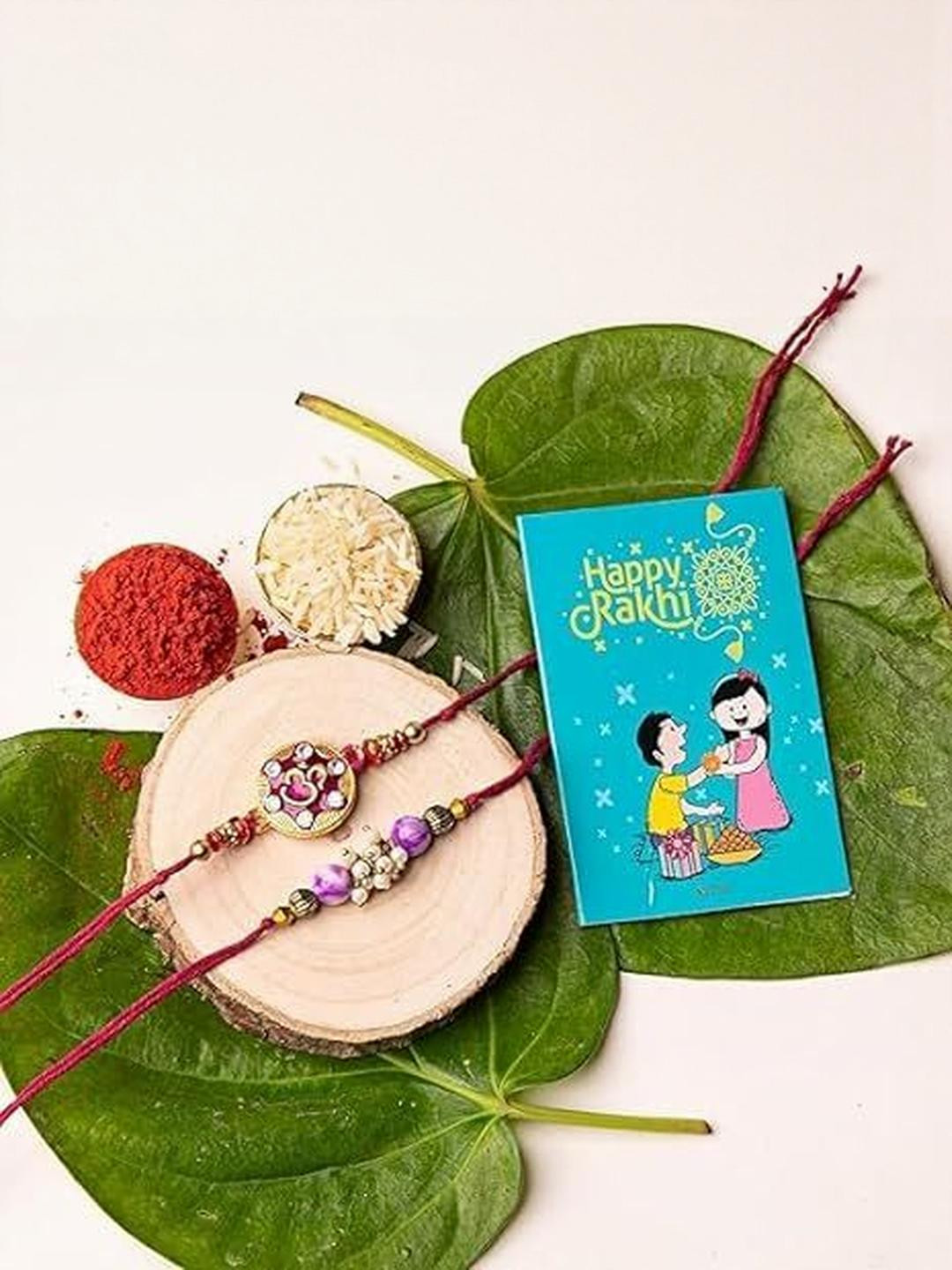 Kaameri Bazaar Set Of 2 Beaded Rakhi Jar Candle Greeting Card & Roli Chawal