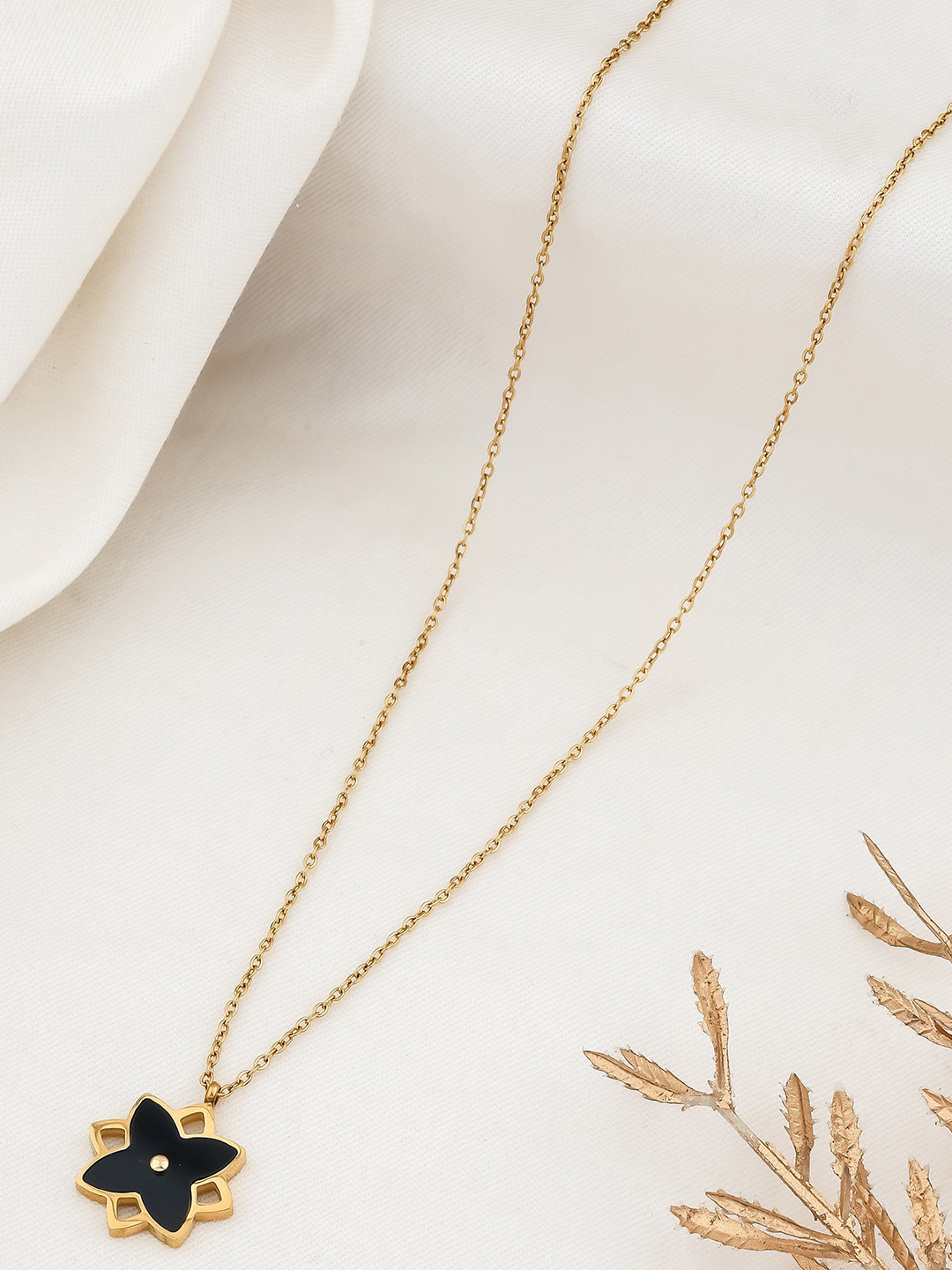 QUERALT Black Enamel Floral Pendant Necklace Gold Toned
