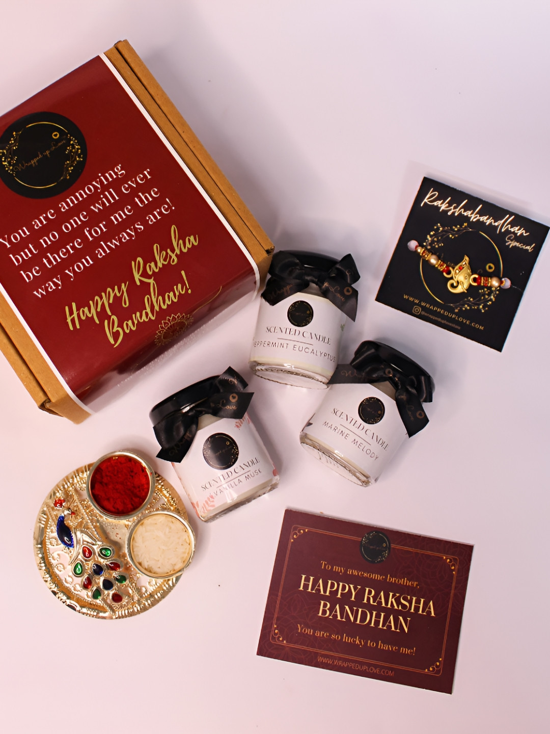 Wrapped up Love Lord Ganesh Artificial Beaded Rakhi Gift Set With Scented Candles