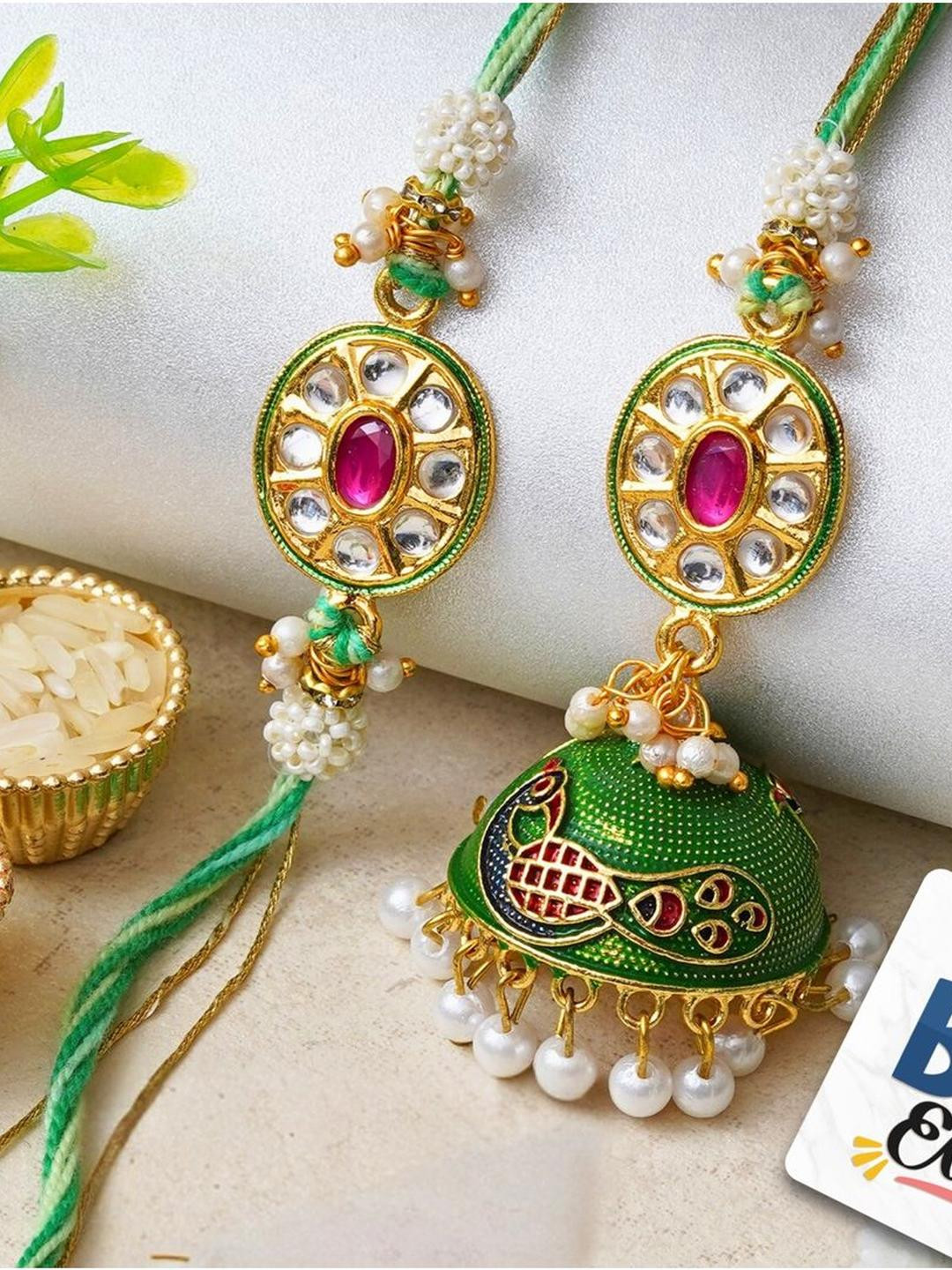 eCraftIndia Set Of 2 Diamond-Studded & Beaded Rakhi With Roli Rice & Fridge Magnet