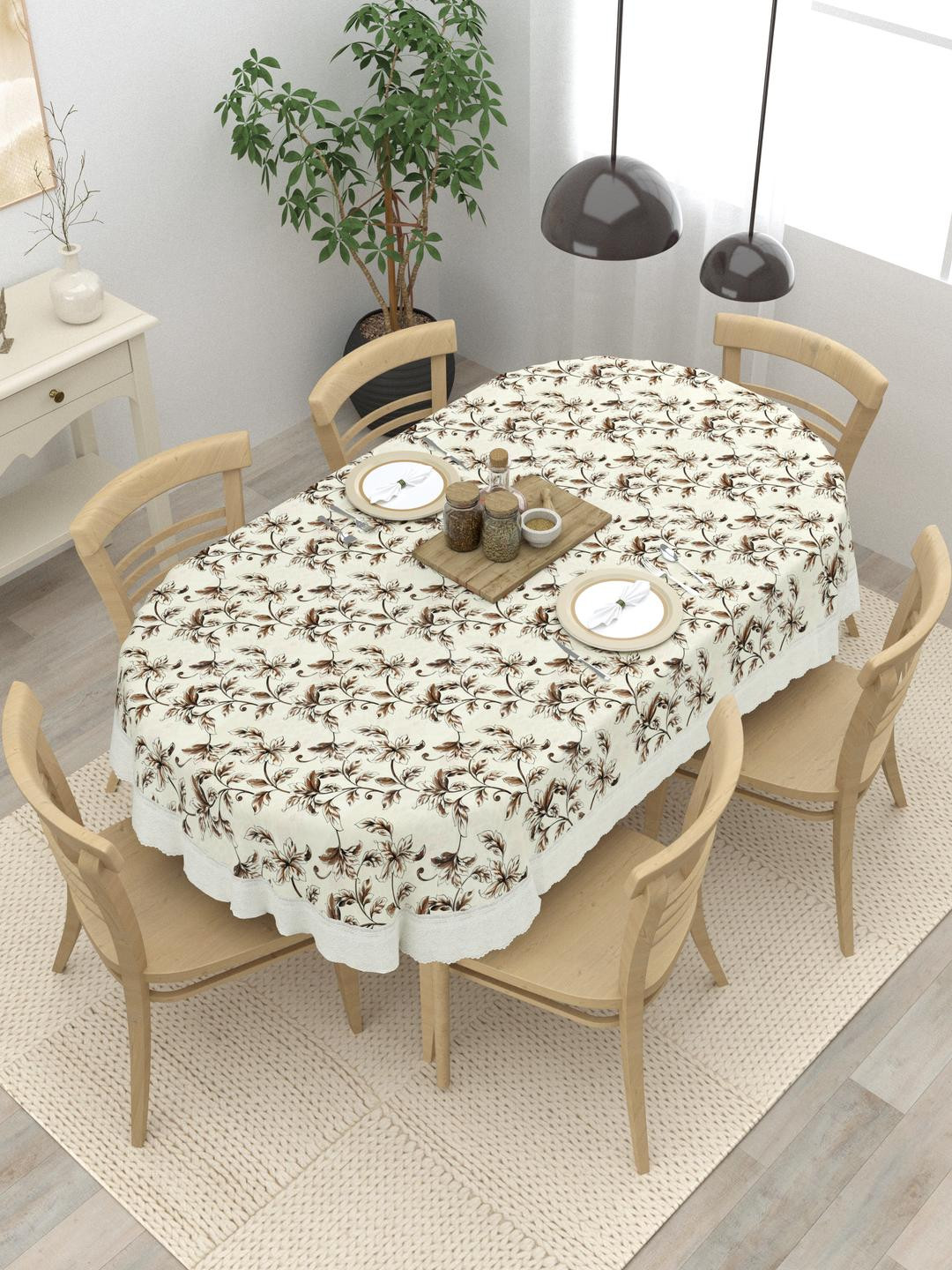 The Home Story Beige Floral Plastic Oval 6-Seater Table Cover