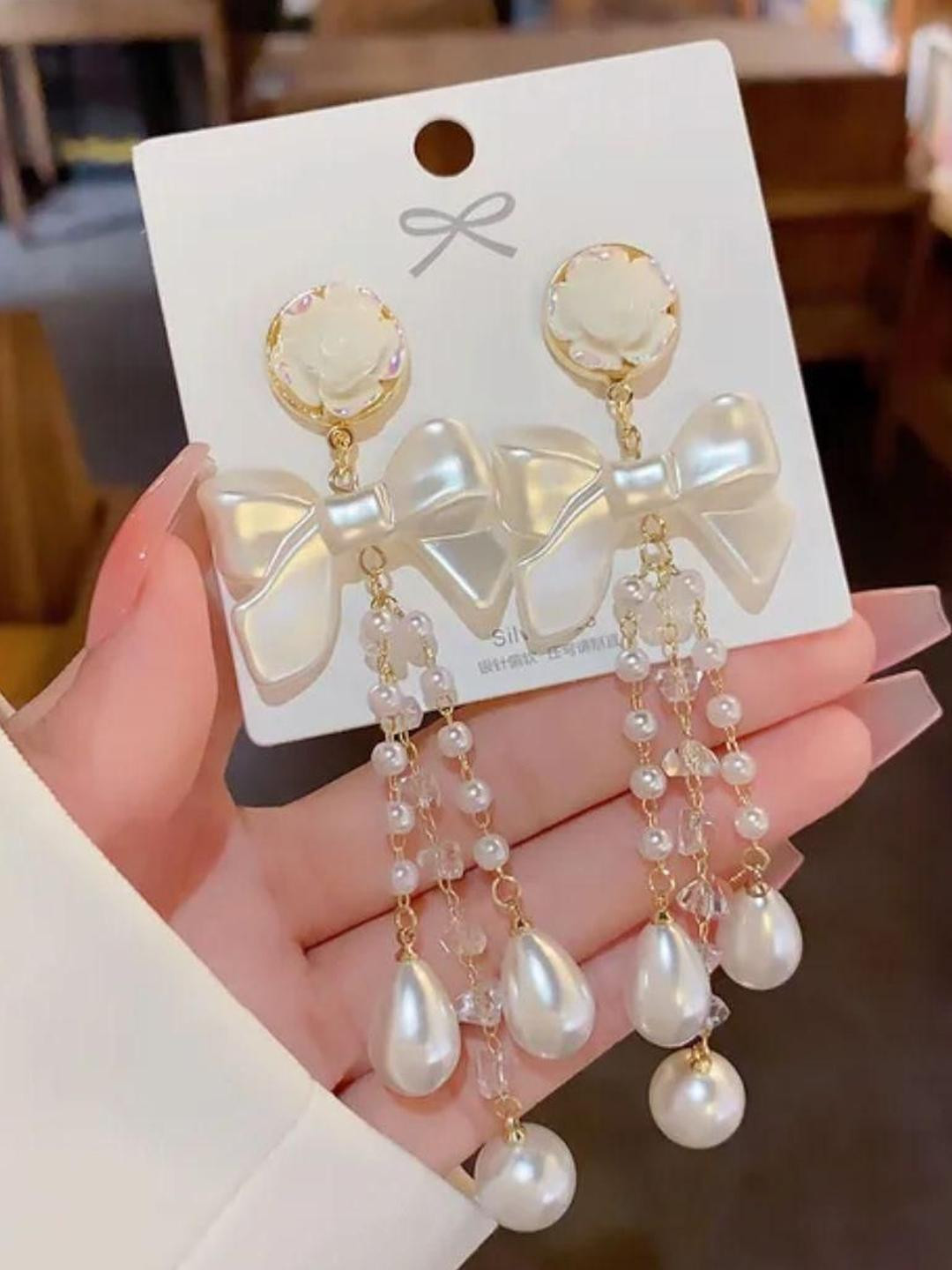 Estailo fashion Pearls Studded And Beaded Floral Shaped Drop Earrings