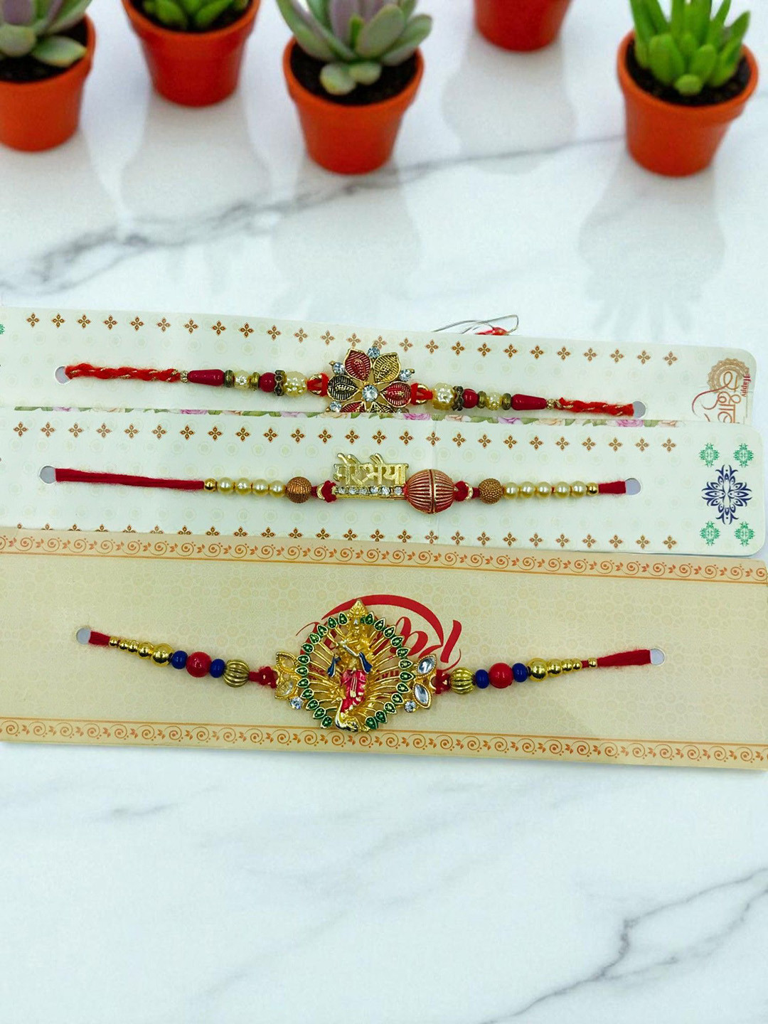 GADINFASHION Set Of 3 Artificial Beaded Thread Rakhis