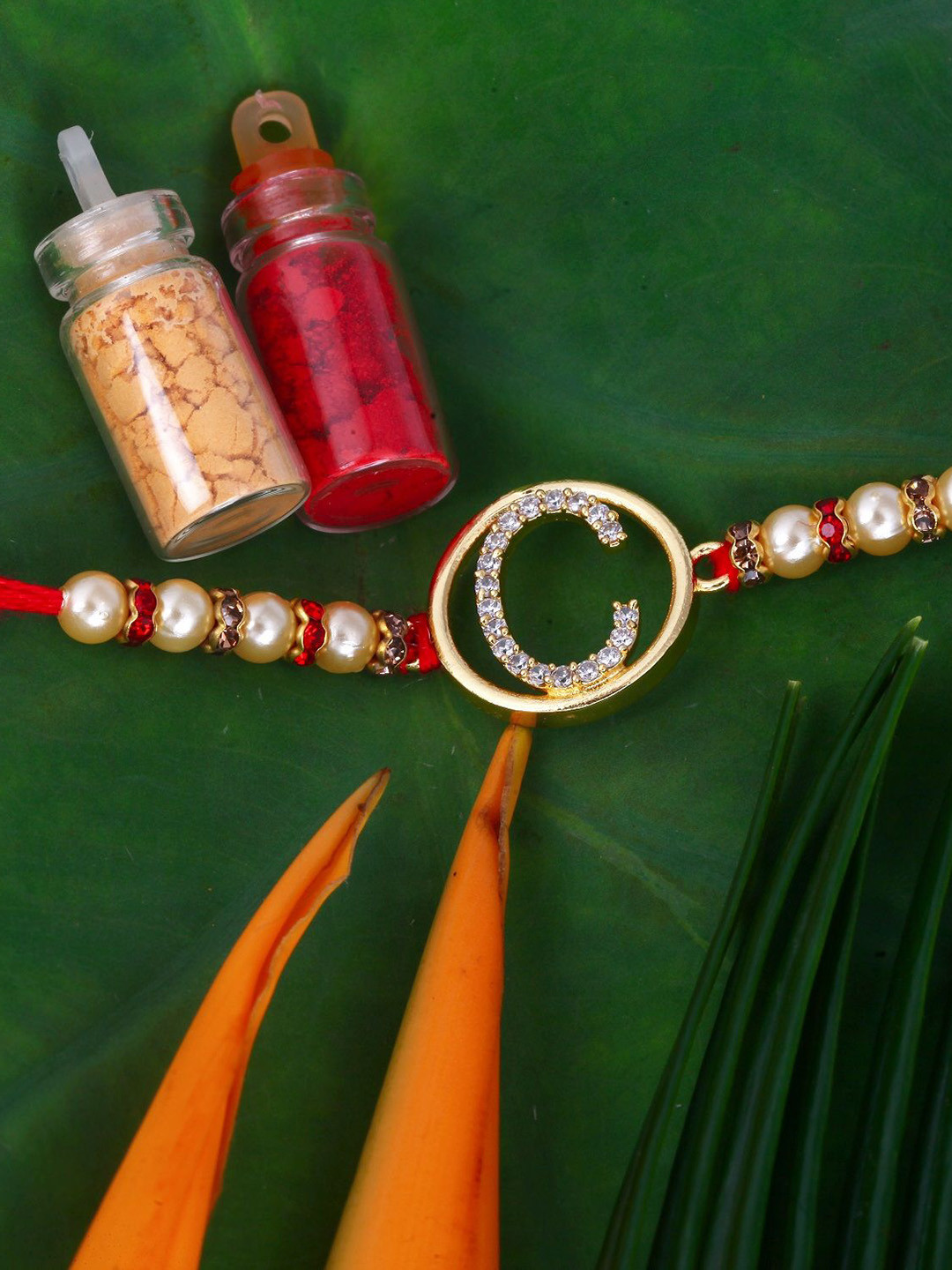 Vighnaharta Gold Plated Cubic Zirconia Studded C Alphabet Thread Rakhi