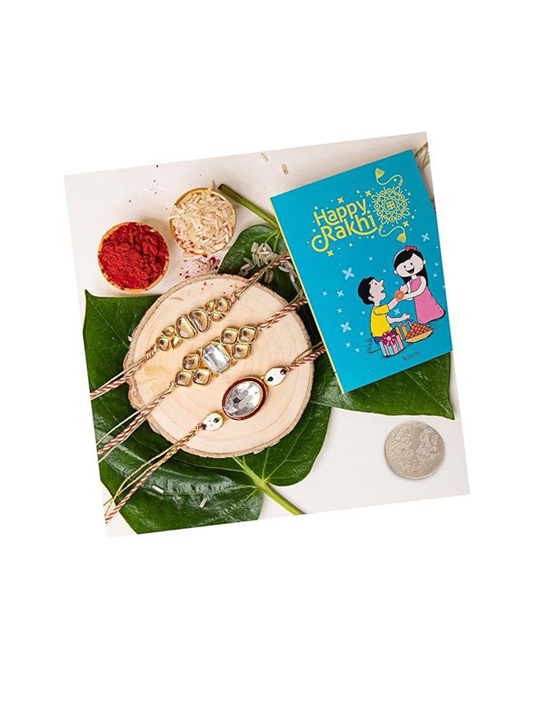Kaameri Bazaar Set Of 3 Crystal Thread Rakhis With Pooja Coin Greeting Card & Roli Chawal