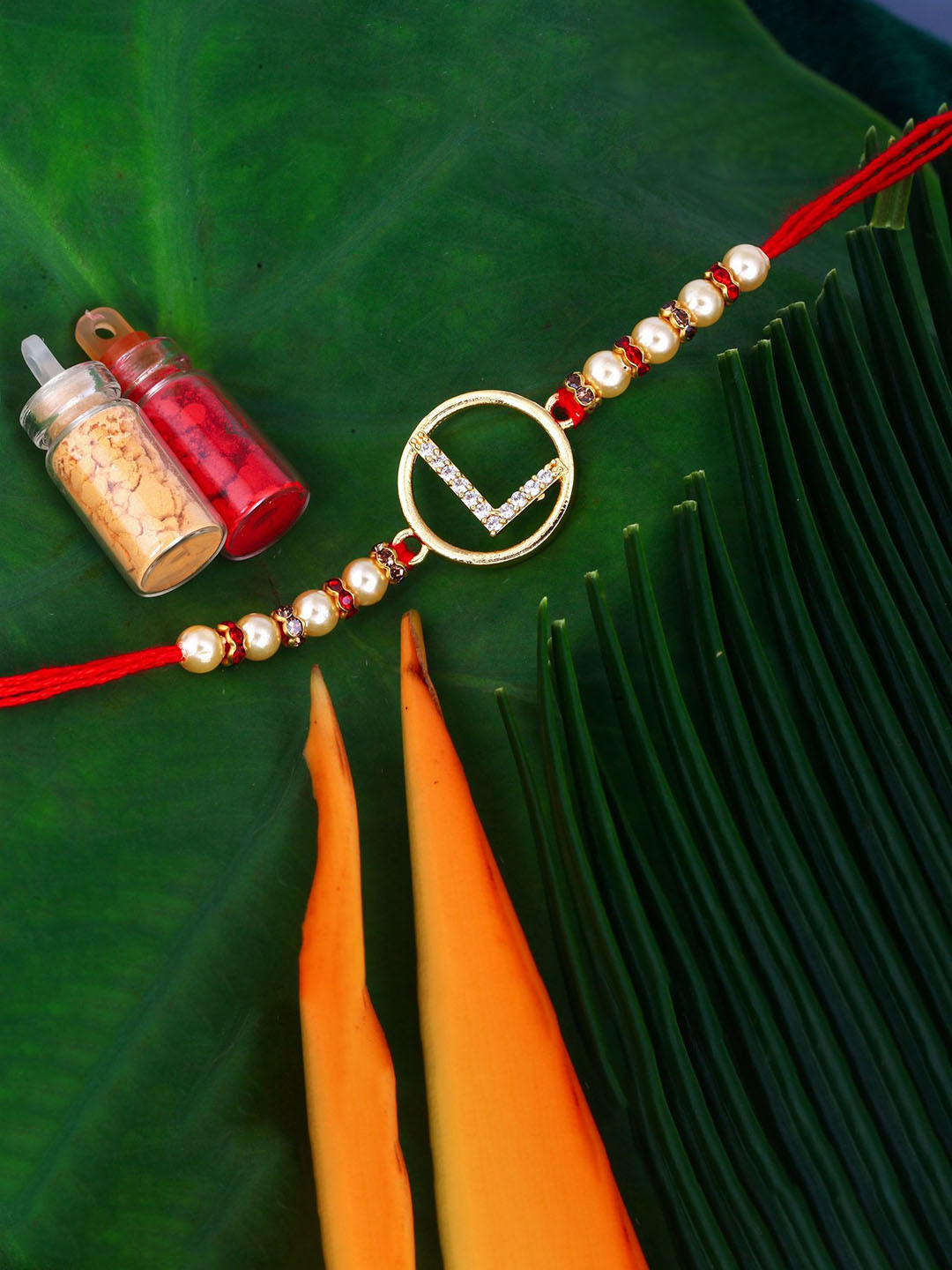 Vighnaharta Gold Plated Cubic Zirconia Studded L Alphabet Thread Rakhi