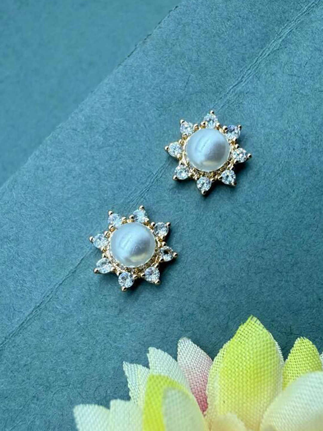 NIKUNJ SALES Gold-Plated Cubic Zirconia Studded Floral Shaped Studs