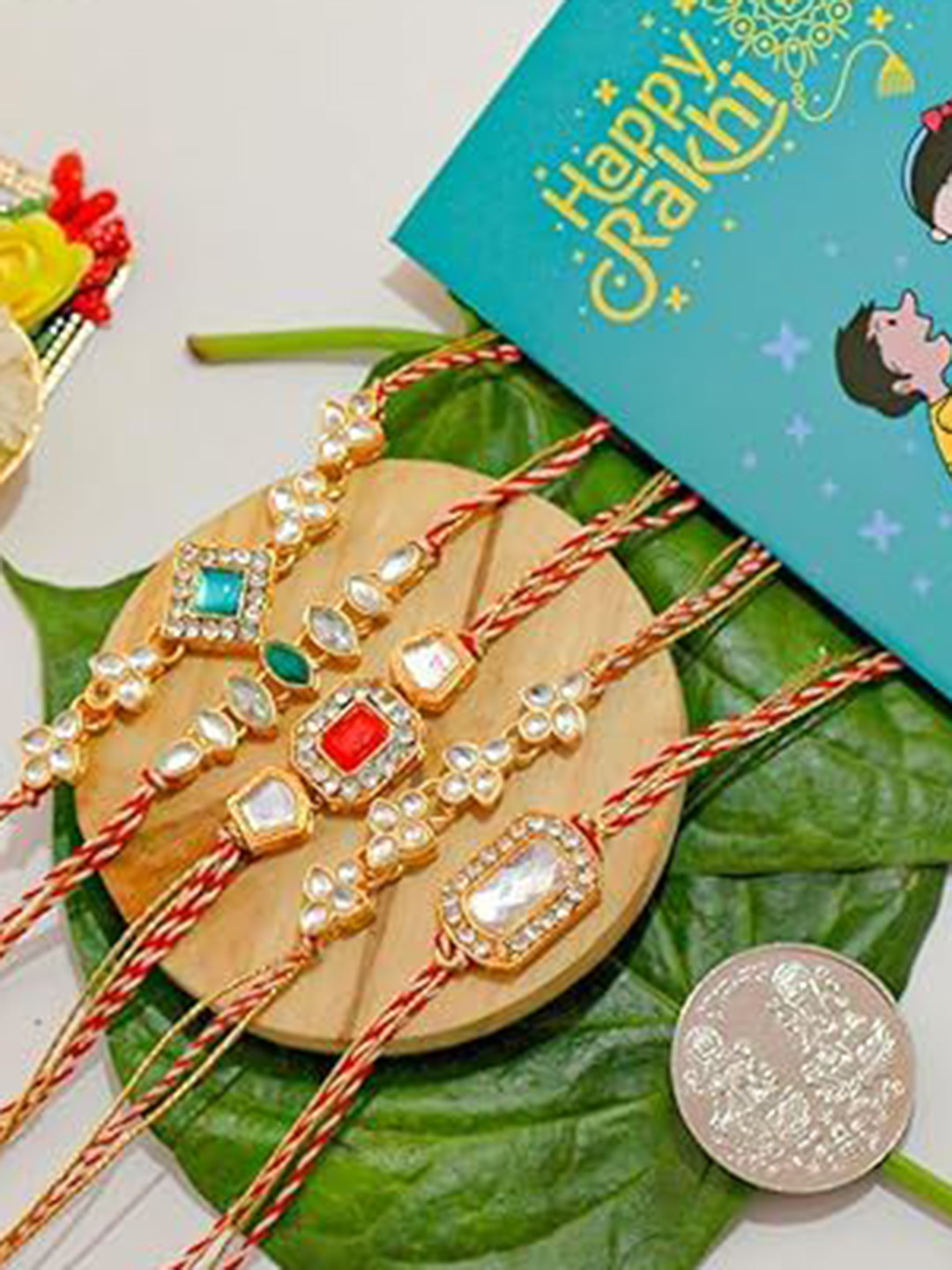 Kaameri Bazaar Set Of 5 Thread Rakhis With Pooja Coin Greeting Card & Roli Chawal