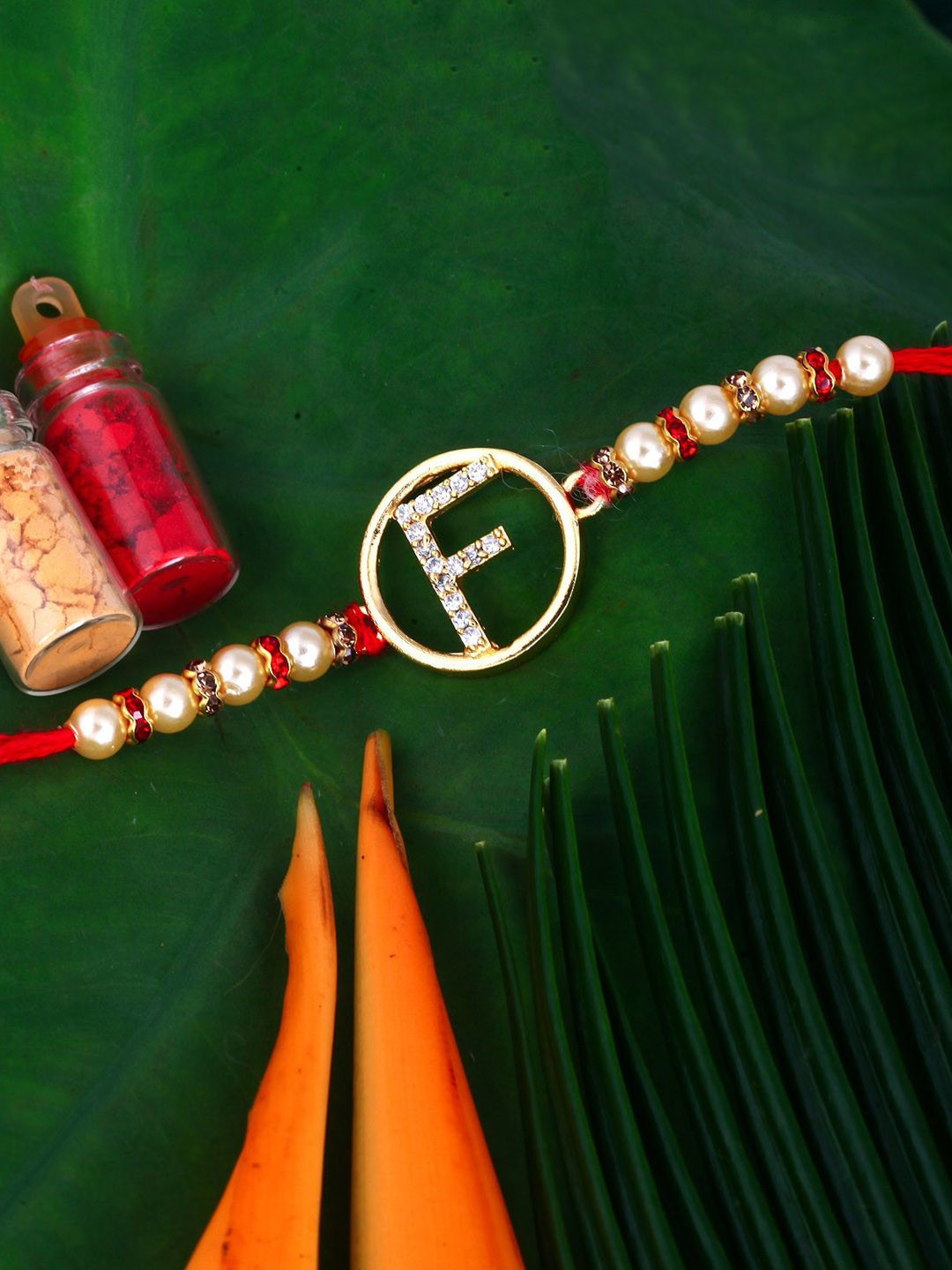 Vighnaharta Gold Plated Initial 'F' Alphabet CZ Rakhi