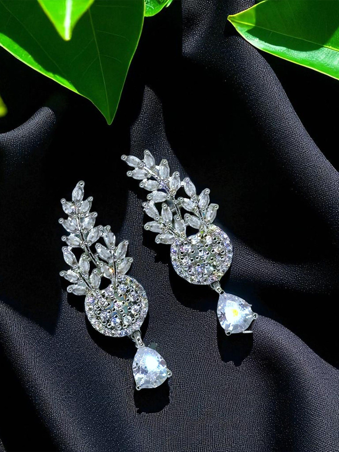 The Pari Rhodium-Plated American Diamond Studded Leaf Shaped Drop Earrings