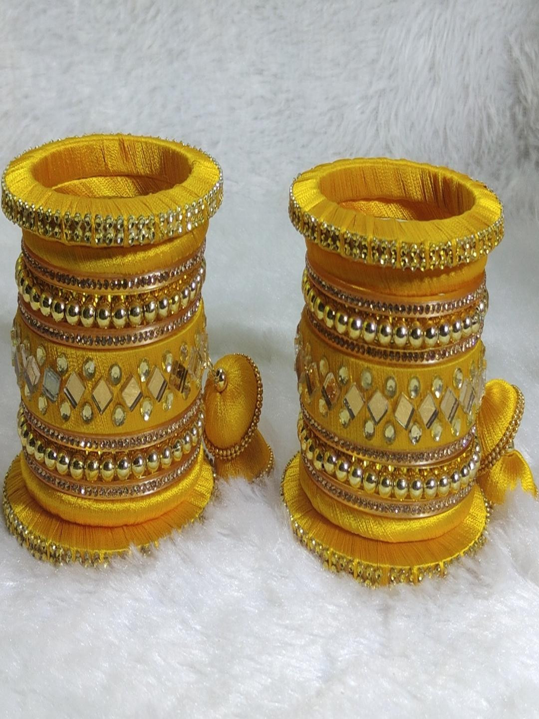 Nisha Jewellers Set of 22 Yellow Plastic Artificial Stones & Beads Bangles
