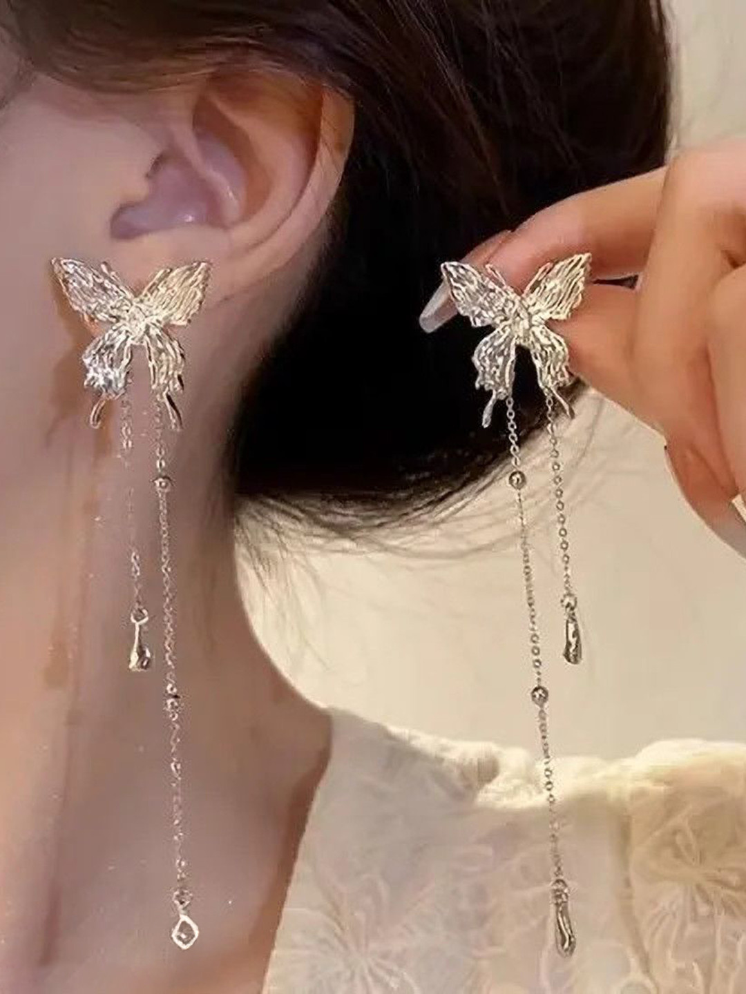 OPUS GEMS Silver-Plated Artificial Stones Studded Butterfly Shaped Drop Earrings