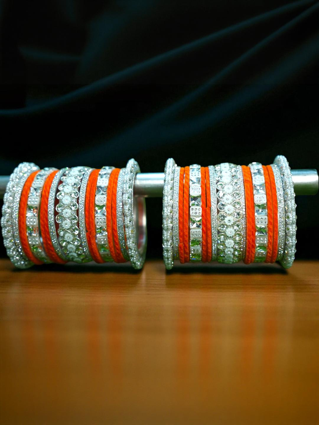 Nari Nakhre Set Of 32 Orange Glass Zircon Bangles