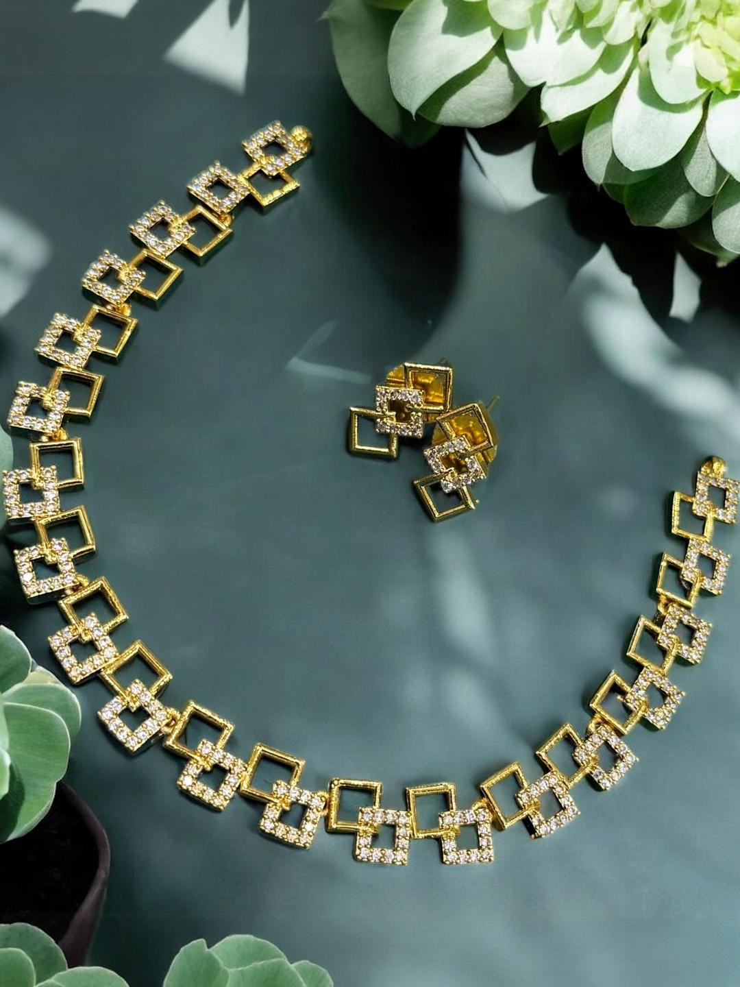 K C JEWELZ Gold-Plated White AD-Studded Brass Jewellery Set