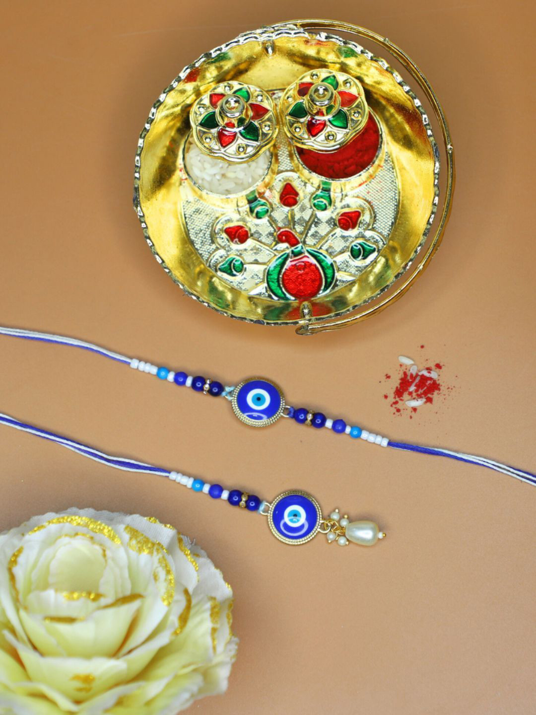 House of Pataudi Set Of 4 Evil Eye Bhaiya Bhabhi Rakhi With Pooja Thali Roli Chawal & Card