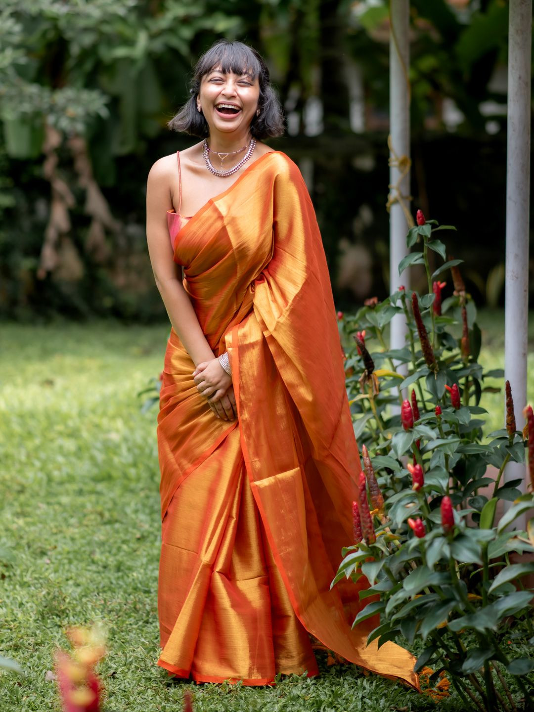Suta Women Solid Rust Tissue Saree