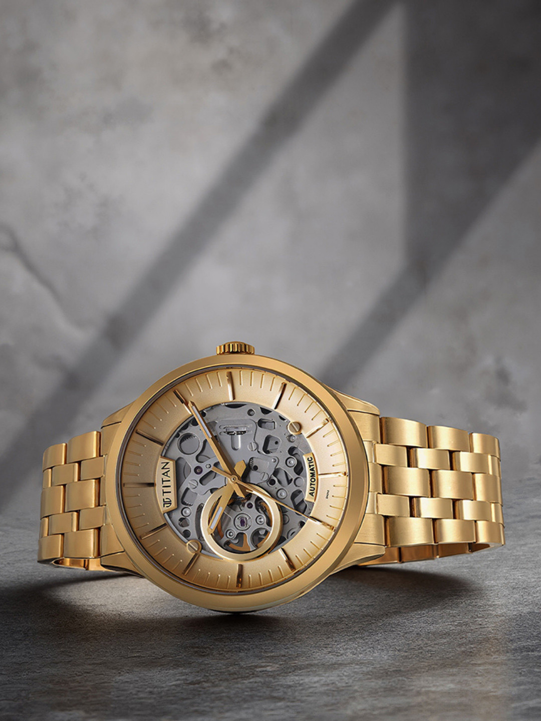 Titan Men Gold-Toned Skeleton Dial & Gold Toned Stainless Steel Bracelet Style Straps Analogue Watch 90140YM01