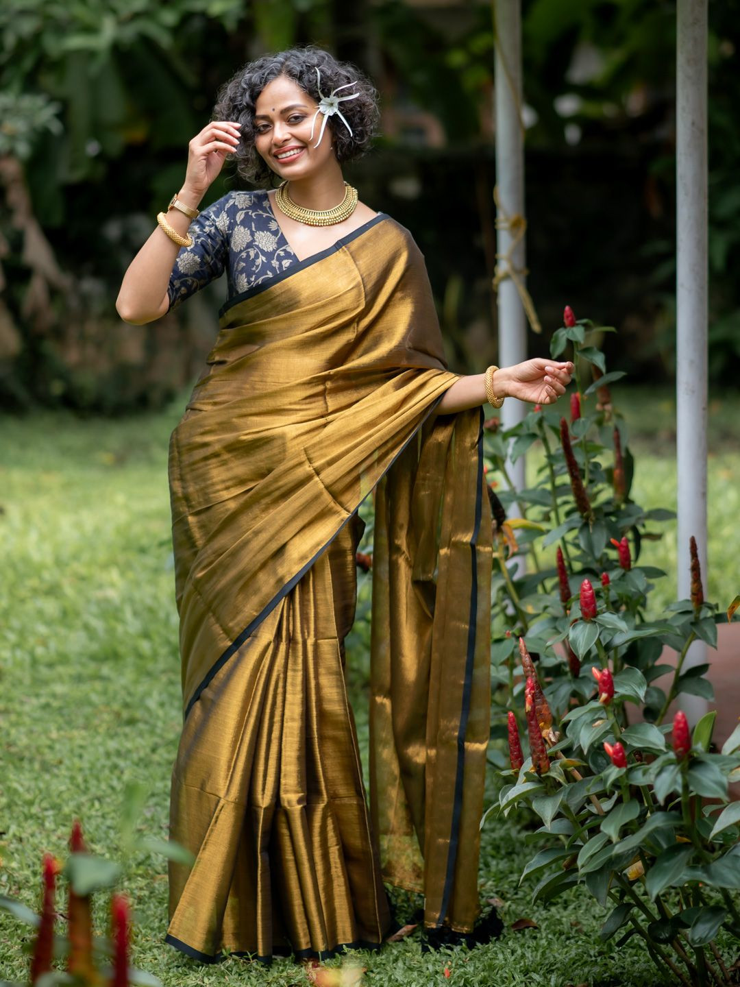 Suta Women Gold Tissue Saree