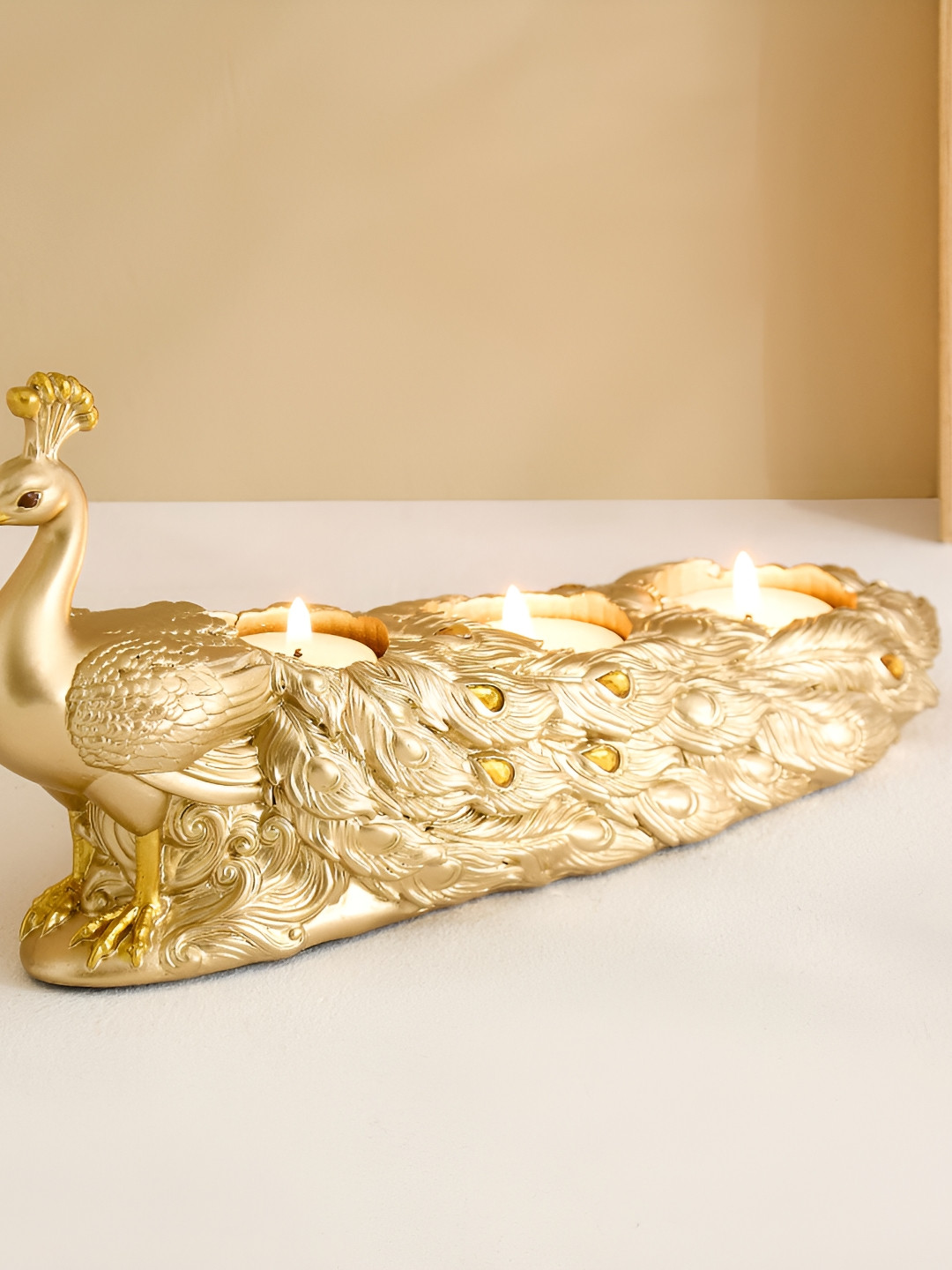 Home Centre Gold-Toned Peacock Candle Holder
