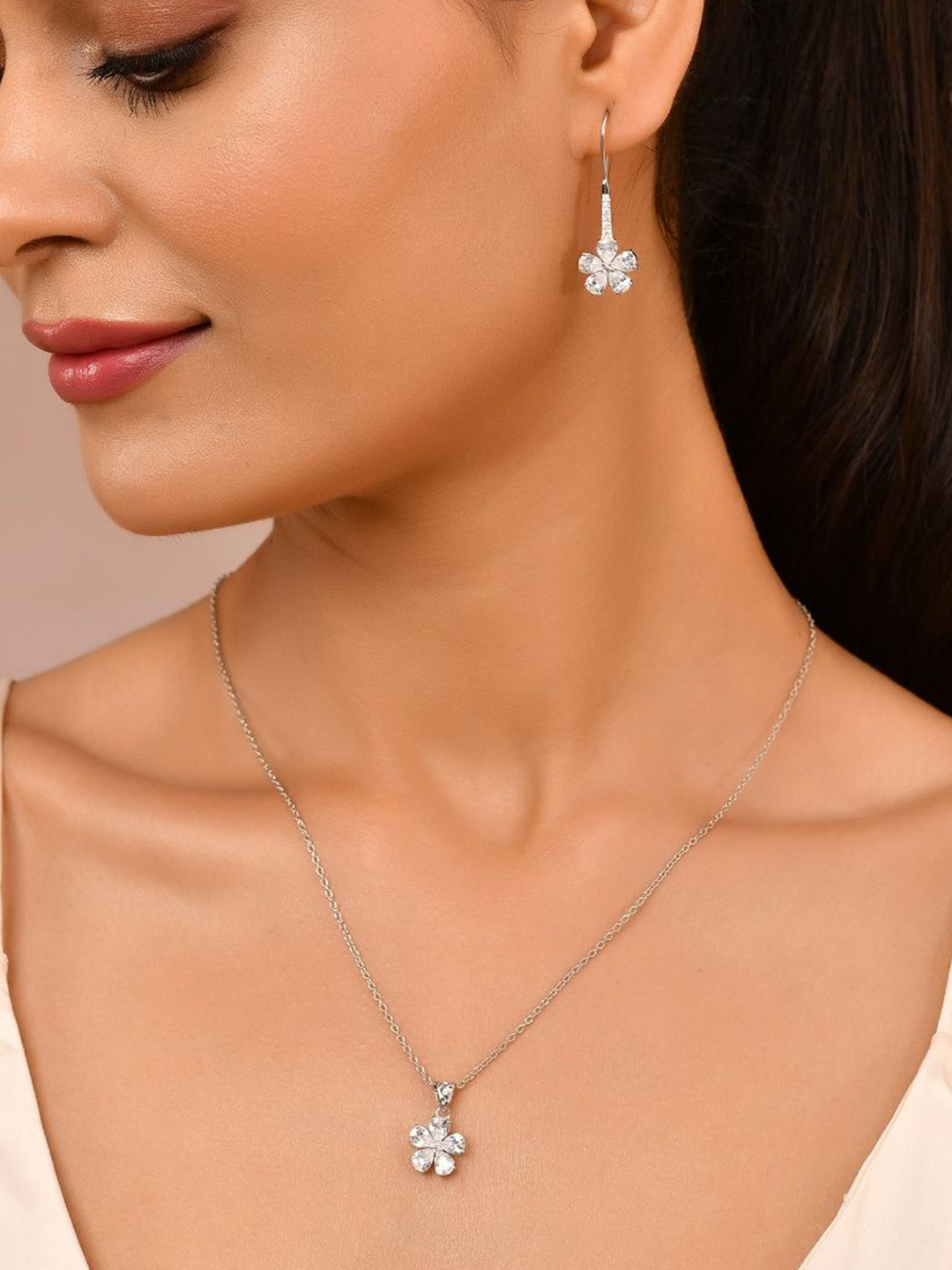 ROOVI Women Rhodium-Plated American Diamond Studded Pendant With Chain