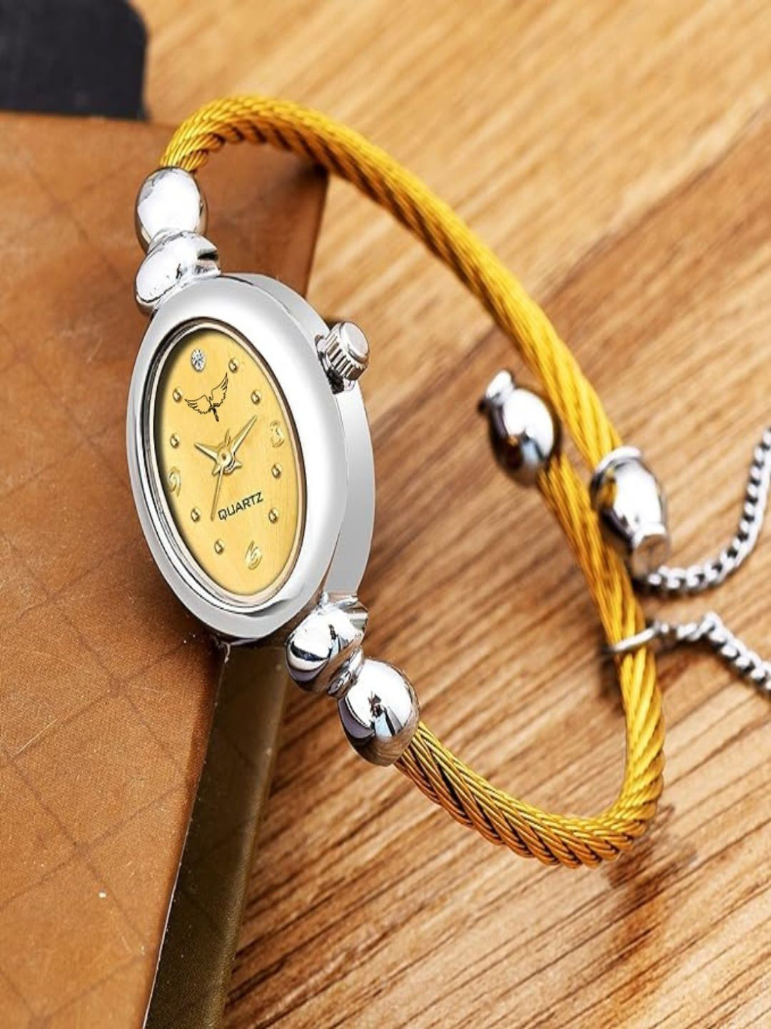 WHITE BIRD Women Brass Oval Dial Analogue Watch W.Kadu Silver & Gold